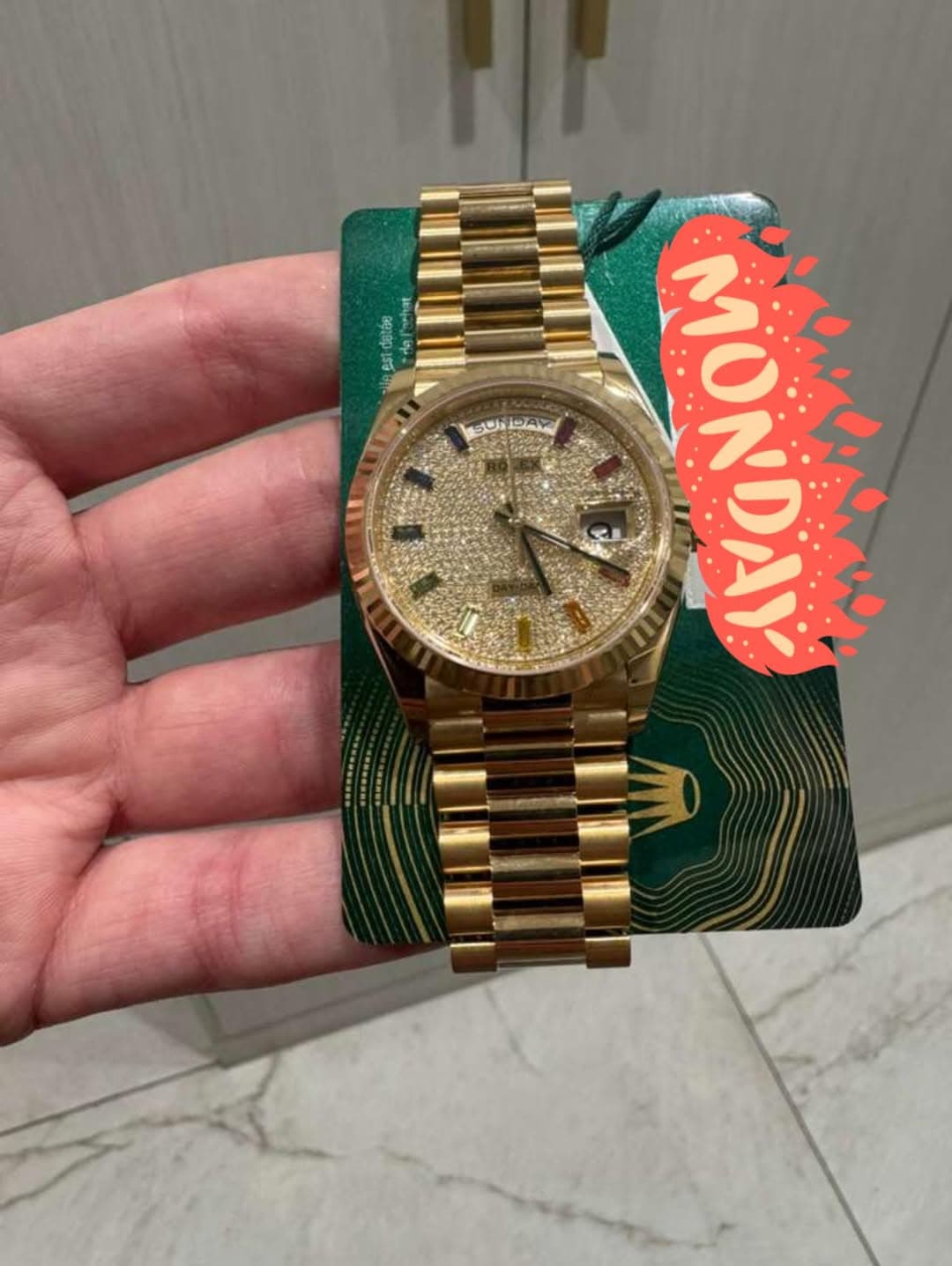 May be an image of wrist watch and text