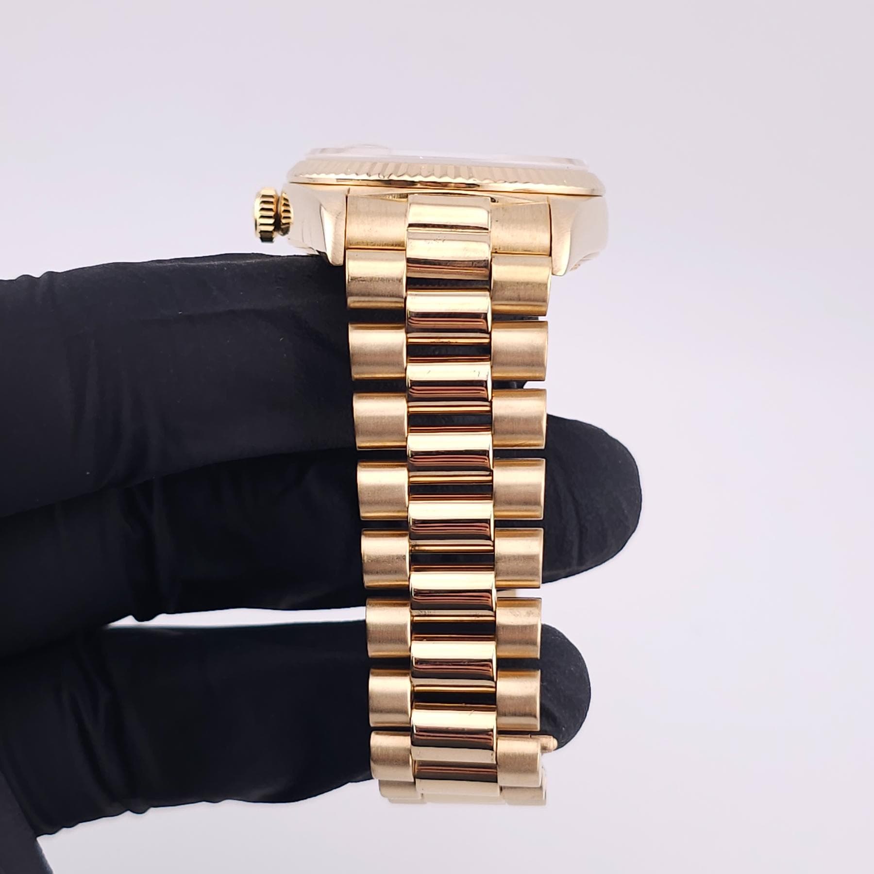 May be an image of wrist watch