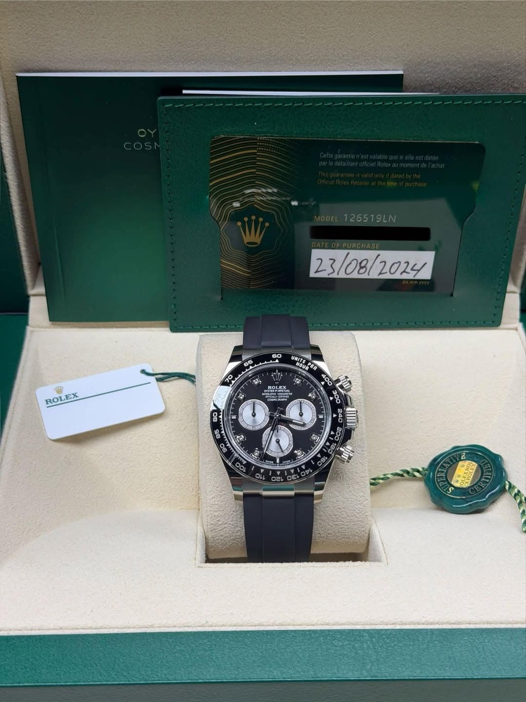 May be an image of wrist watch and text