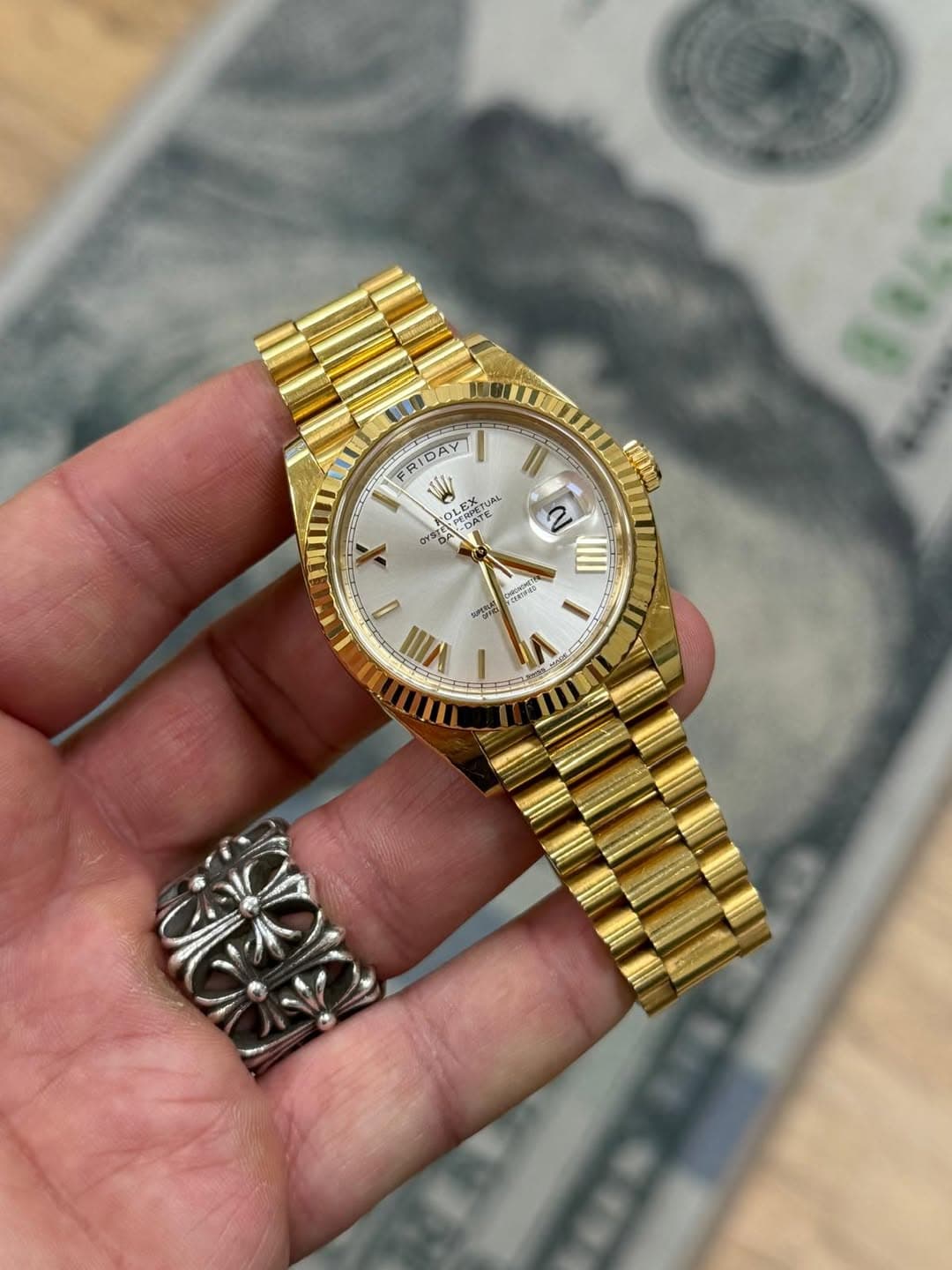 May be an image of wrist watch and text
