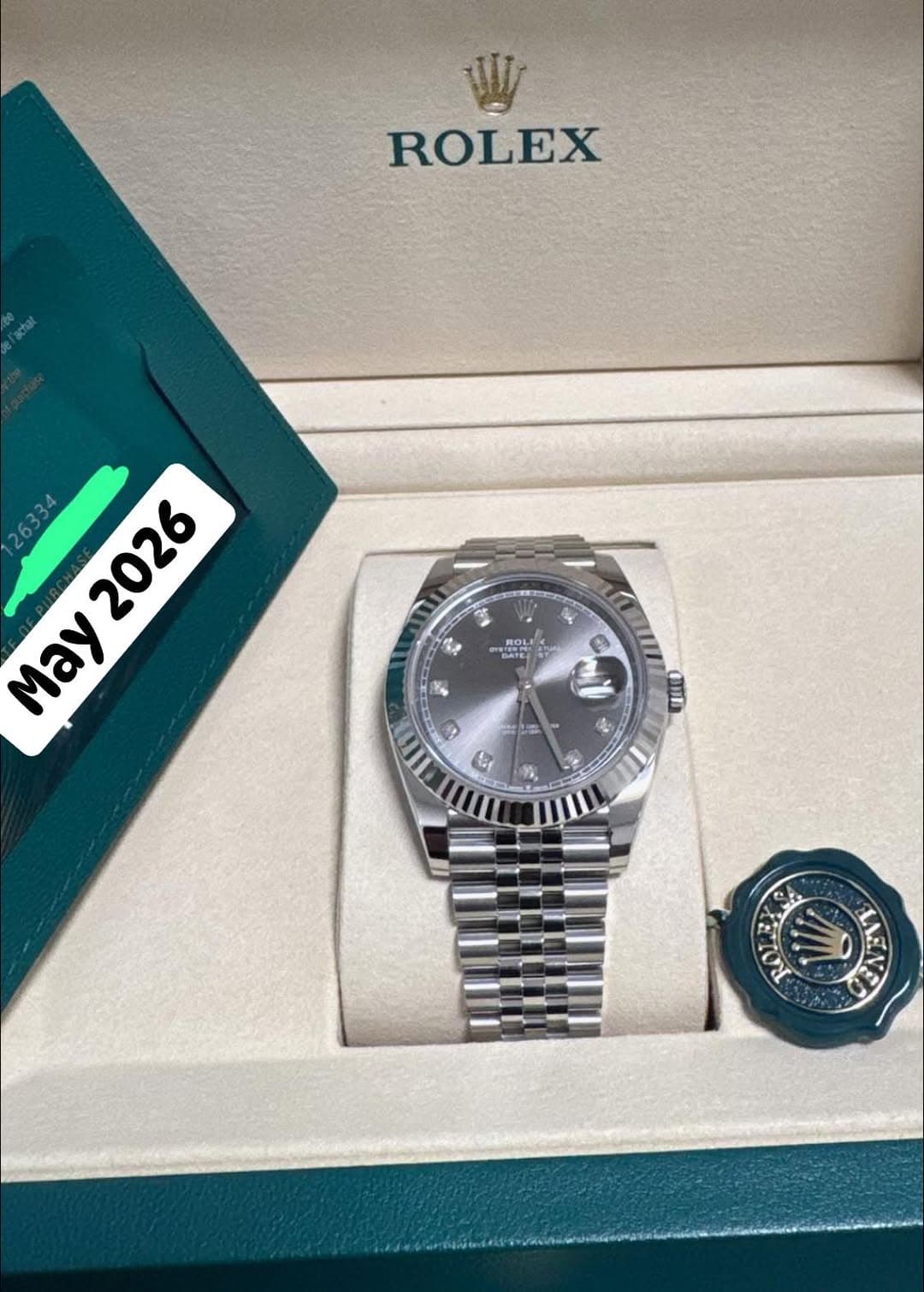 May be an image of wrist watch and text that says 'ROLEX L 公 BT aten DATE Ma2026 May 2026 M 全 4 9 E y ூ = 福 9 JENENT ENEV'