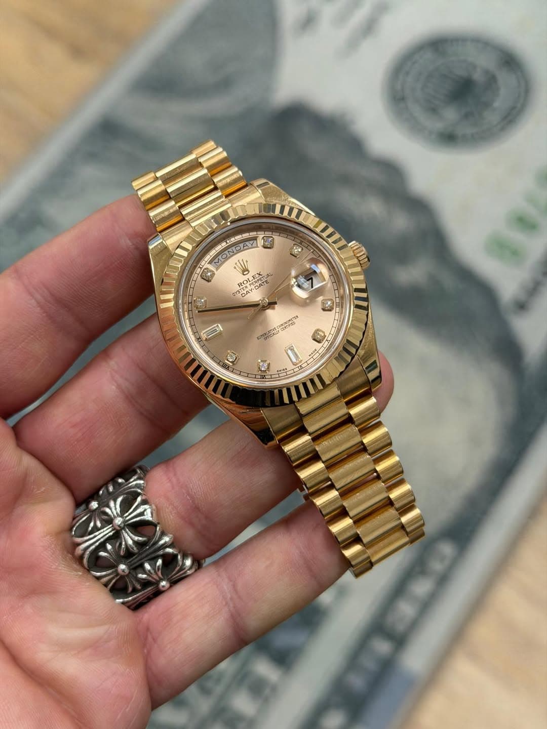 May be an image of wrist watch and text