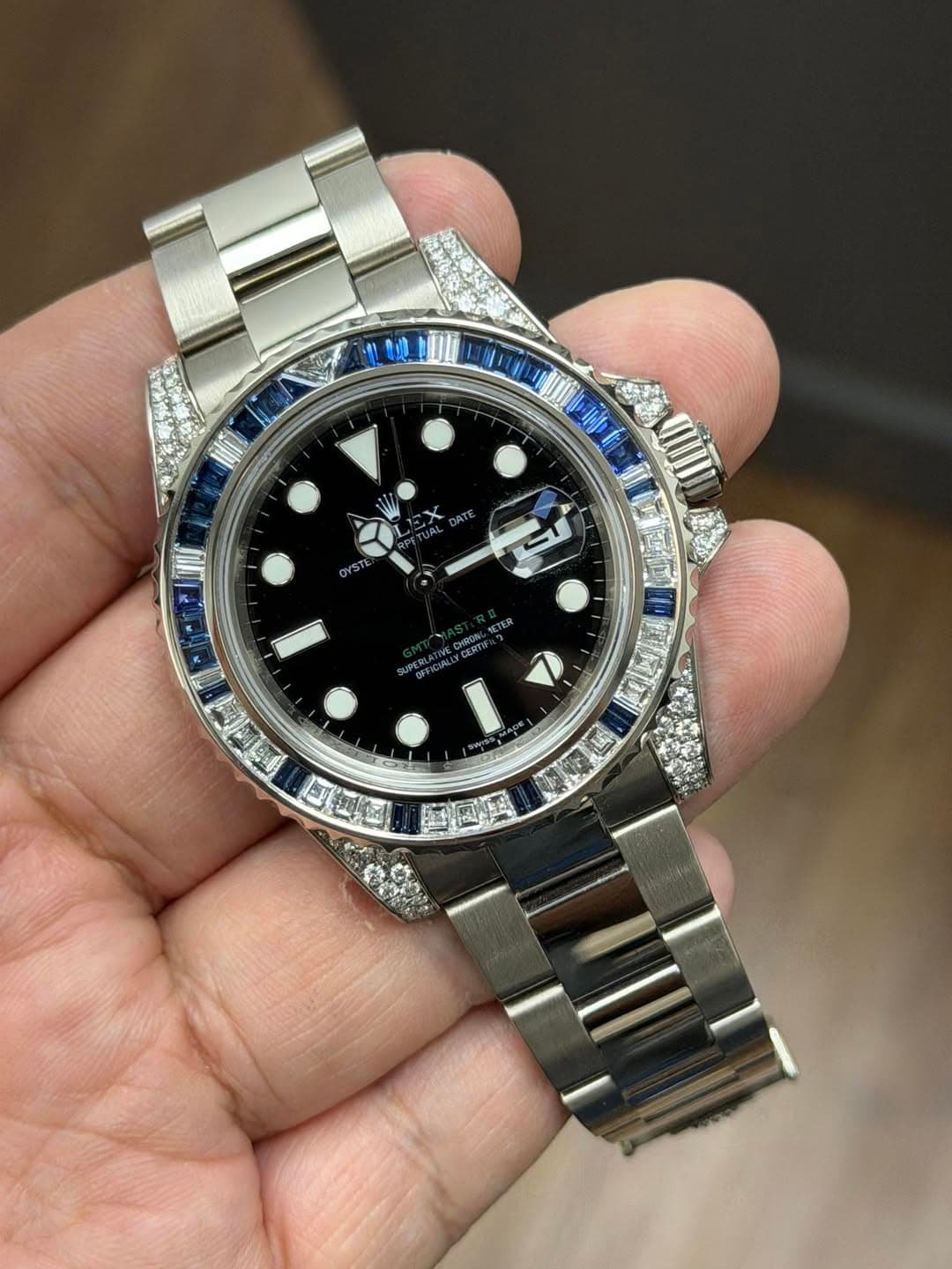 May be an image of wrist watch and text