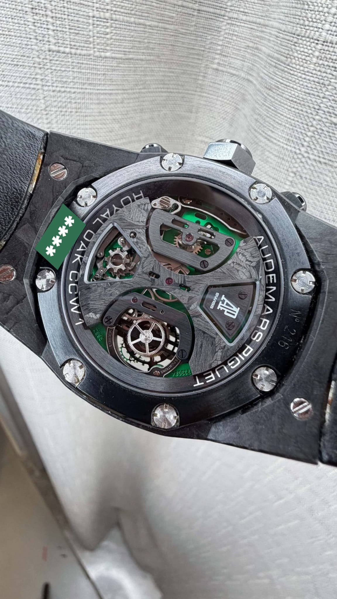 May be an image of wrist watch and text