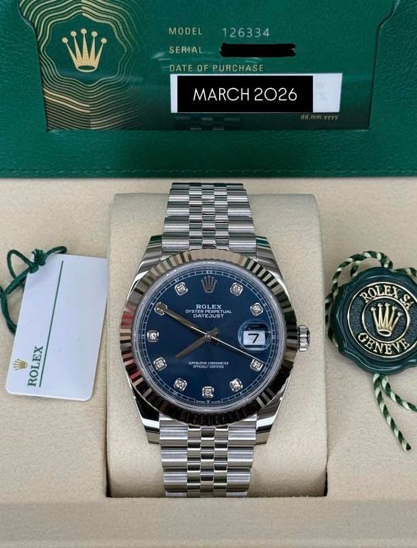 May be an image of wrist watch and text that says 'MODEL 126334 SERIAL DAT DATEOFPURCHASE OF PURCHASE MARCH2026 MARCH 2026 ب ROLEX ROEPETUA UAL OYSTER STERPERPETU DA EJUS 安 ရး…