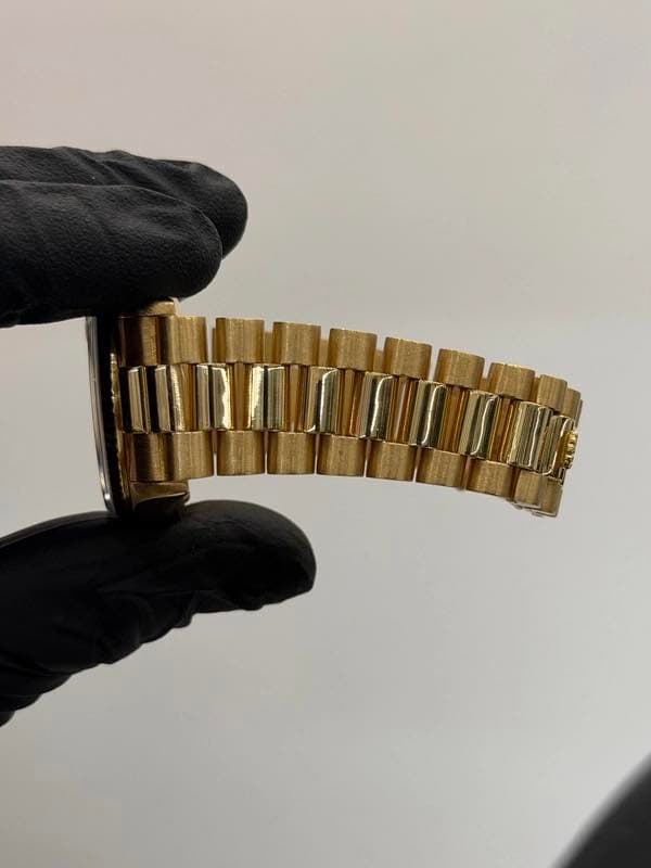 May be an image of wrist watch
