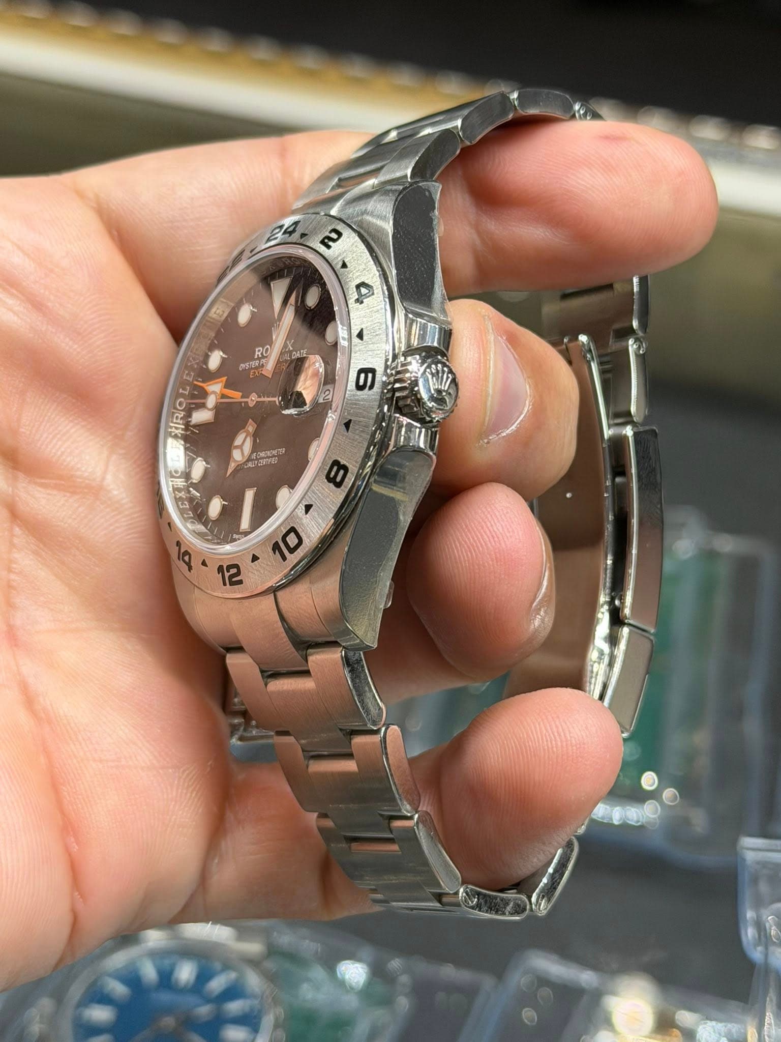 May be an image of wrist watch and text