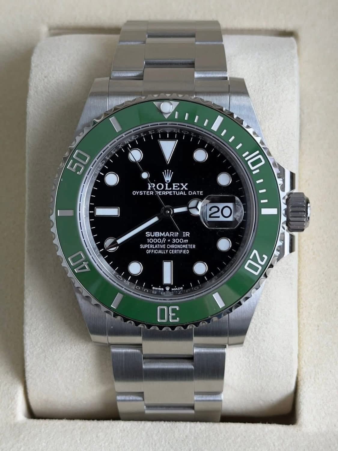May be an image of wrist watch and text that says '50 ROLEX OYSTER OYSTER.PERPETUALDATE PERPE TUAL DATE 10 20 SUBMARINIR SUBMARIA IR 1000f 300m 300m OFFICIALLYCERTIFIED SUPERLATI…