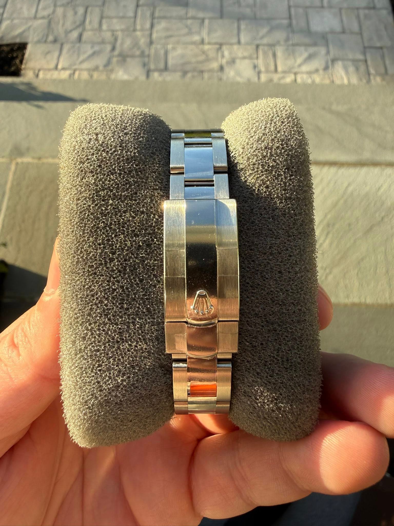 May be an image of jewelry and wrist watch