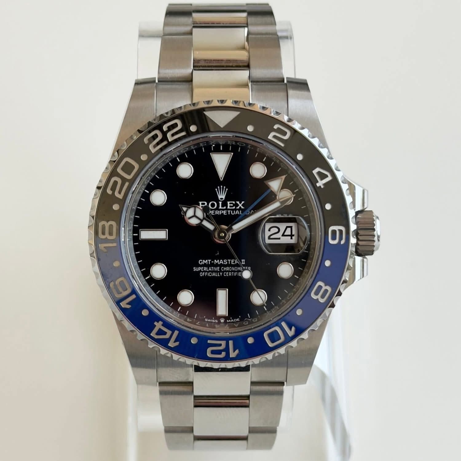 May be an image of wrist watch and text that says ' POLEX ERP 4 24 GMT -MASTER PEBLATH OERCIALLYCE 6 16 14 WSS 12 8 10'