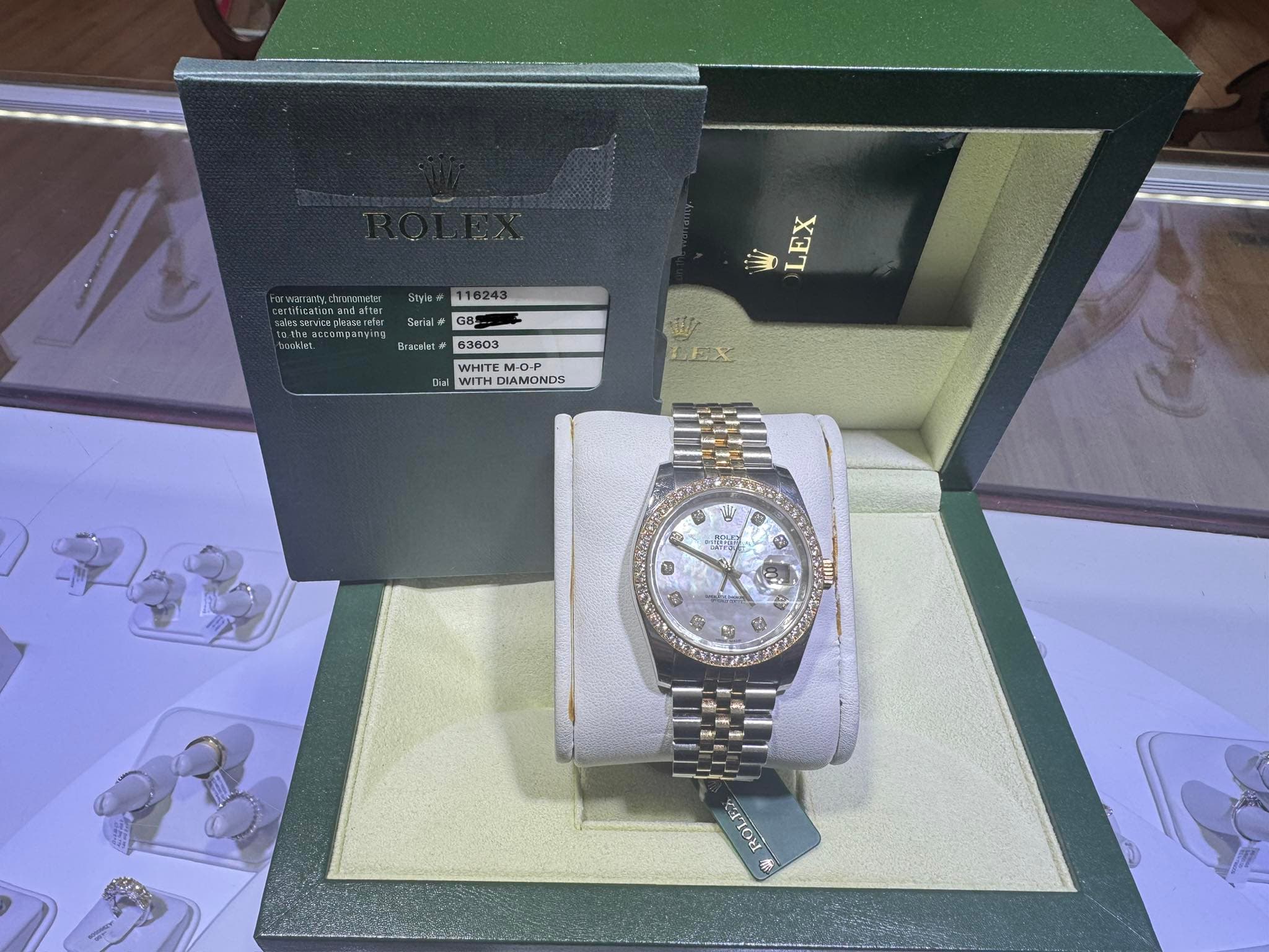 May be an image of wrist watch and text