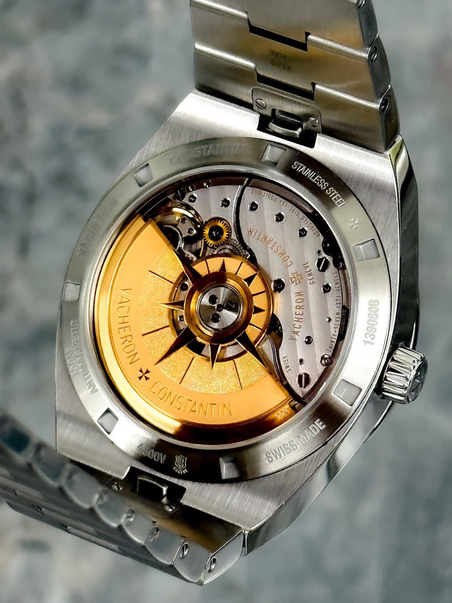 May be an image of wrist watch and text