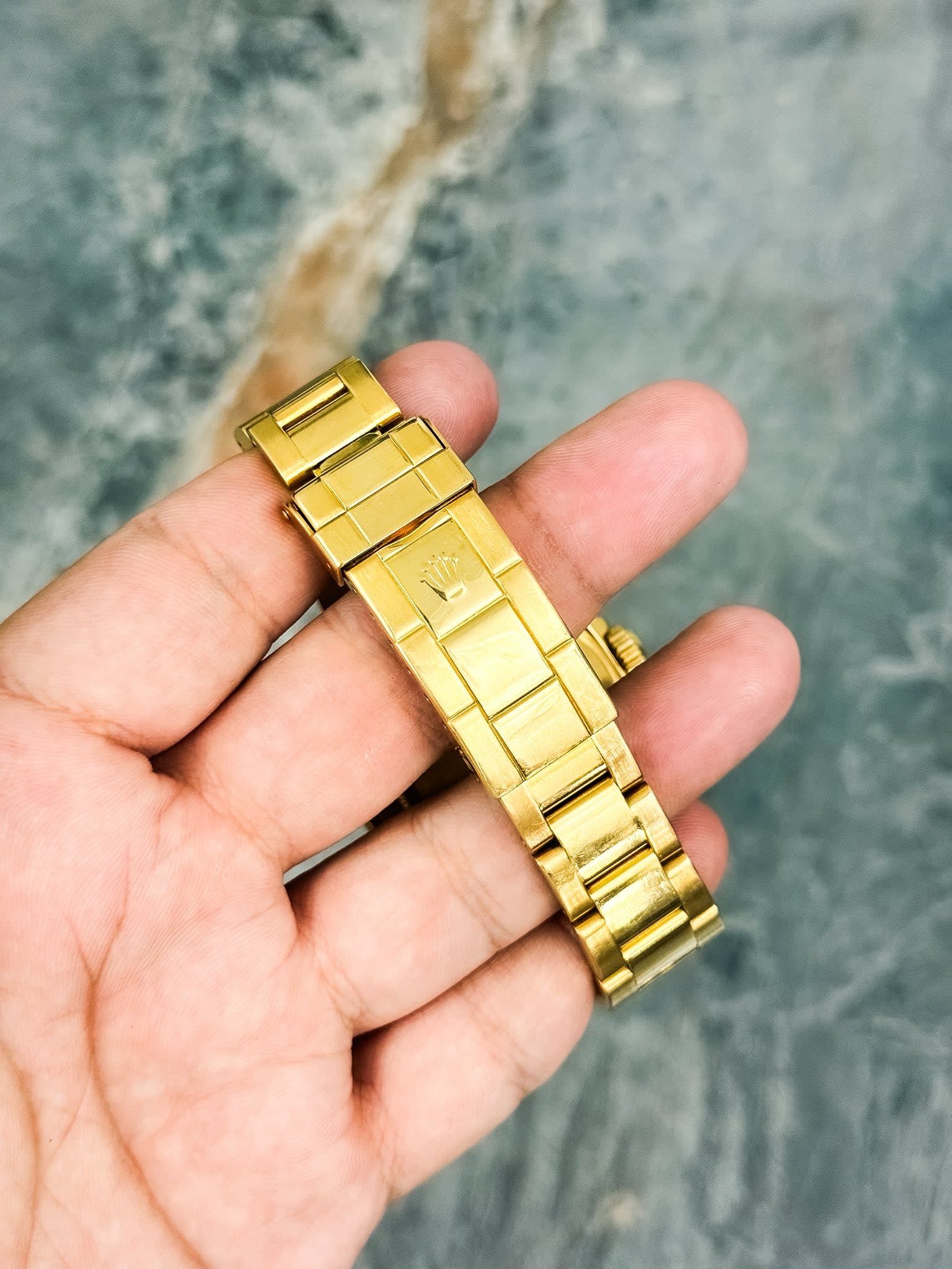 May be an image of jewelry and digital watch