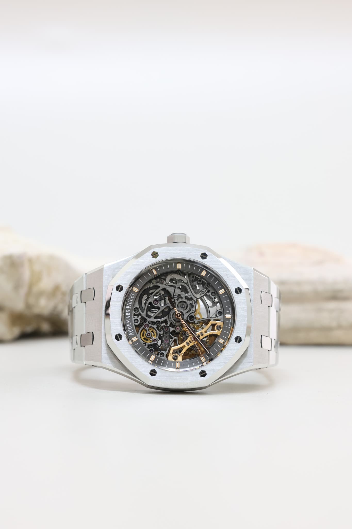 May be an image of wrist watch and text