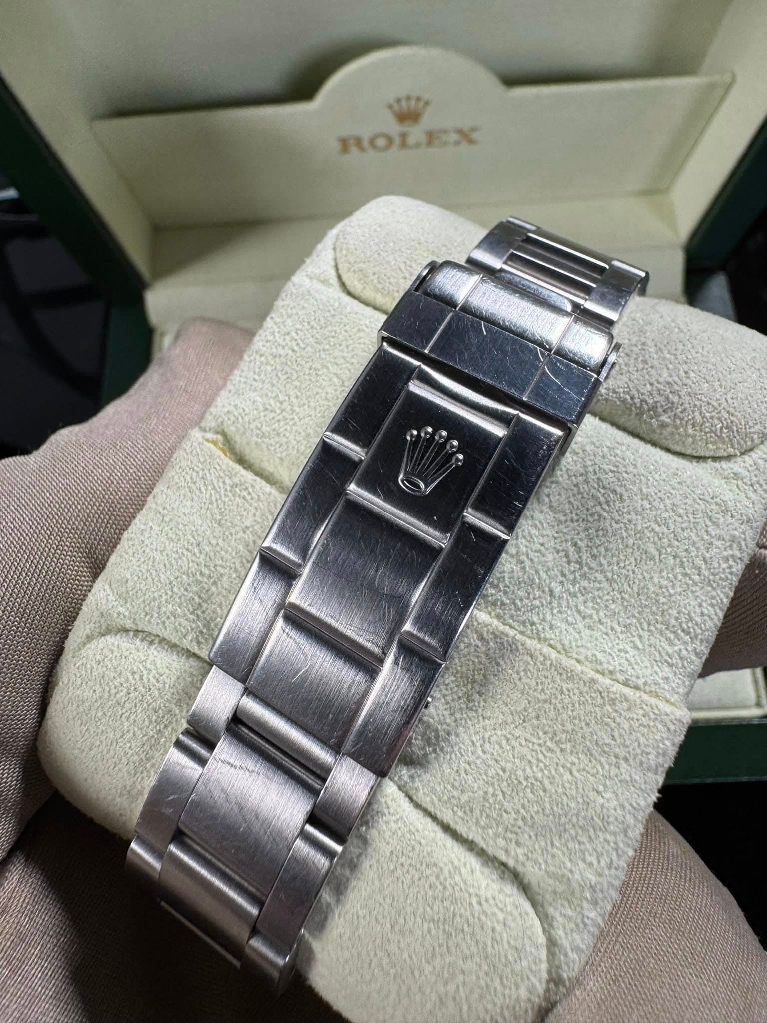 May be an image of wrist watch and text that says 'ROLEX'