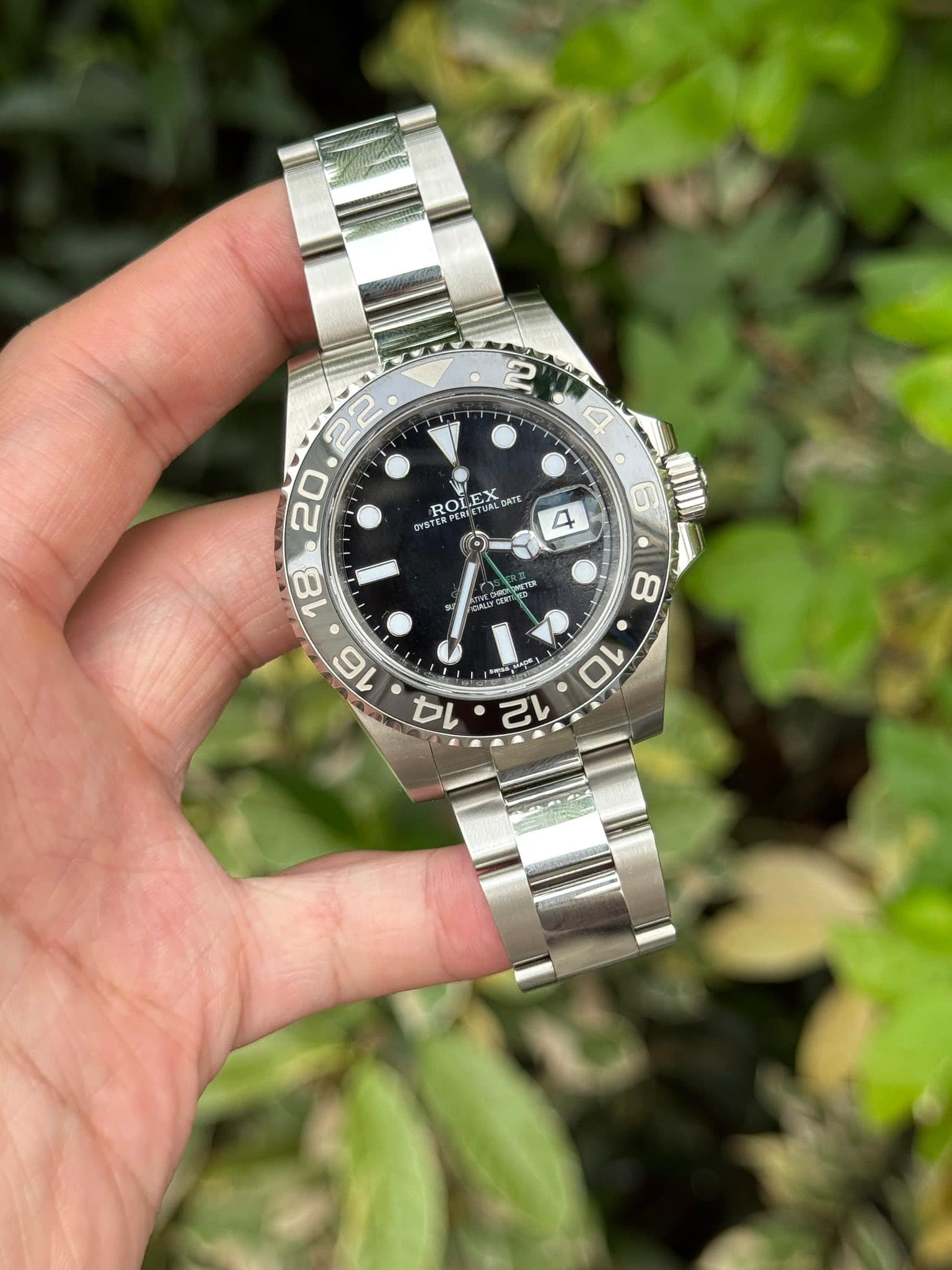 May be an image of wrist watch and text