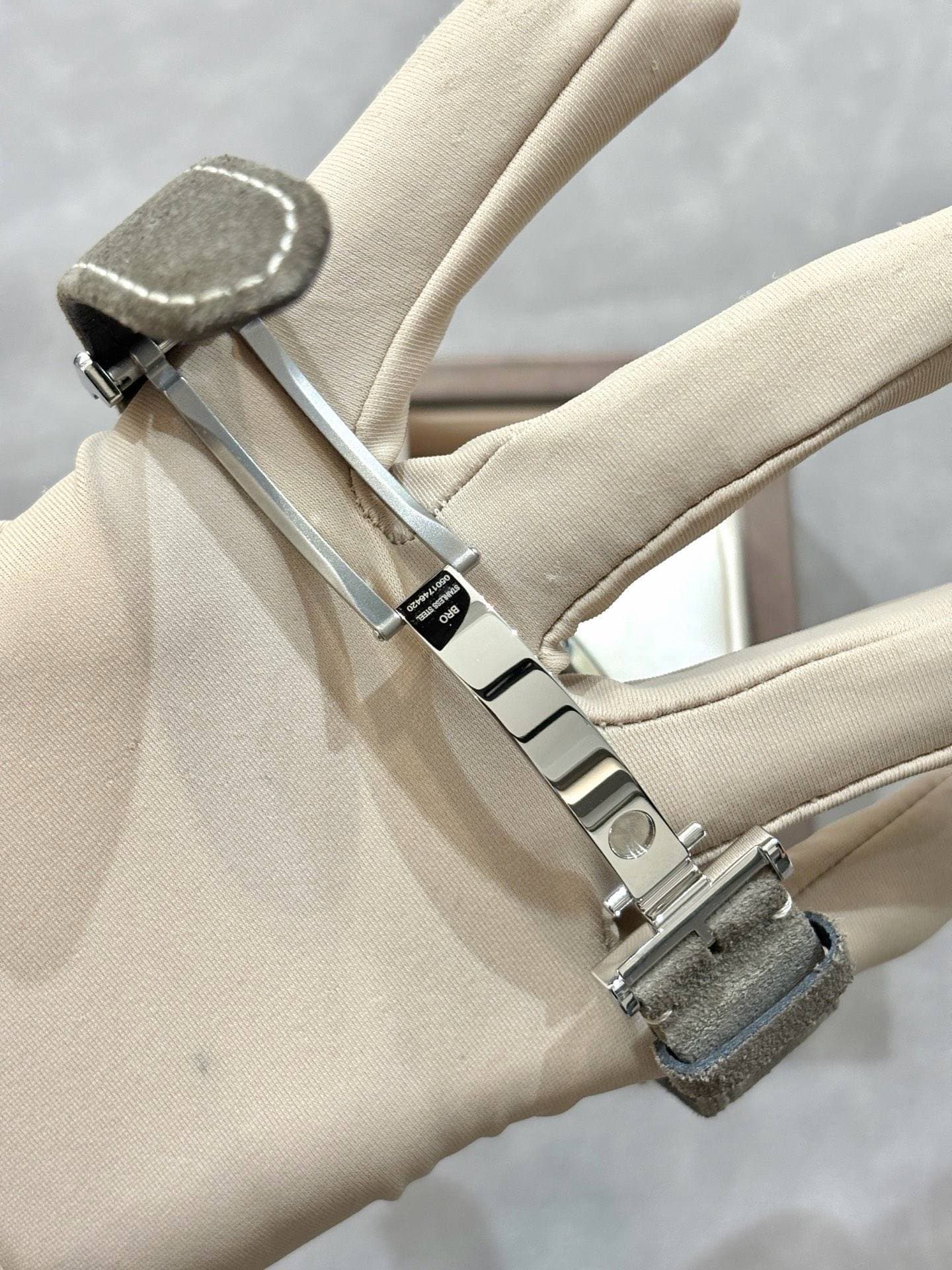 May be an image of wrist watch and leather
