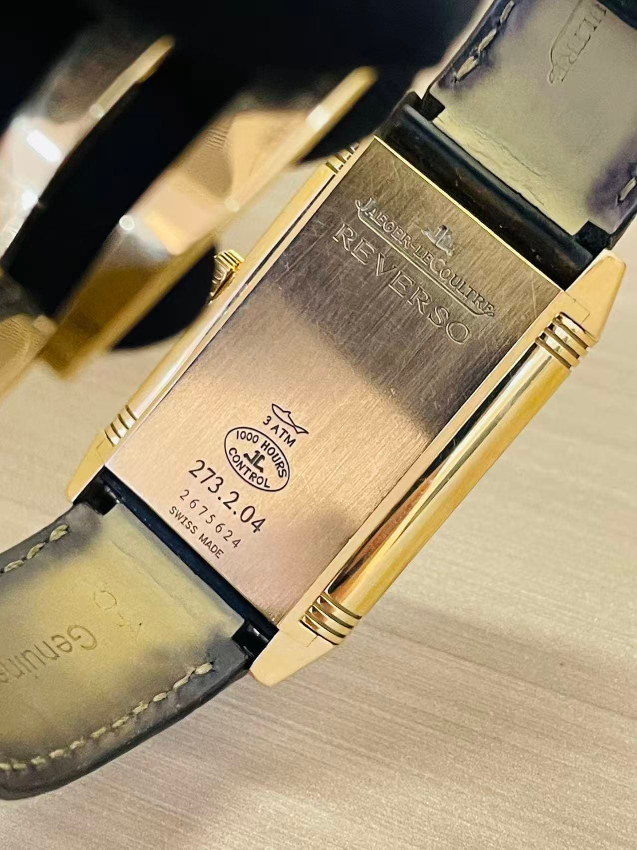 May be an image of wrist watch and text that says 'اللل 日4 REVERSO AECER-LECOULTRE AEG AEGER تفات EVERSO RE 1000 273 CONTROL αυπροι HOURS 3ATM ATM SWISS CUESMADE NTROL MADE…