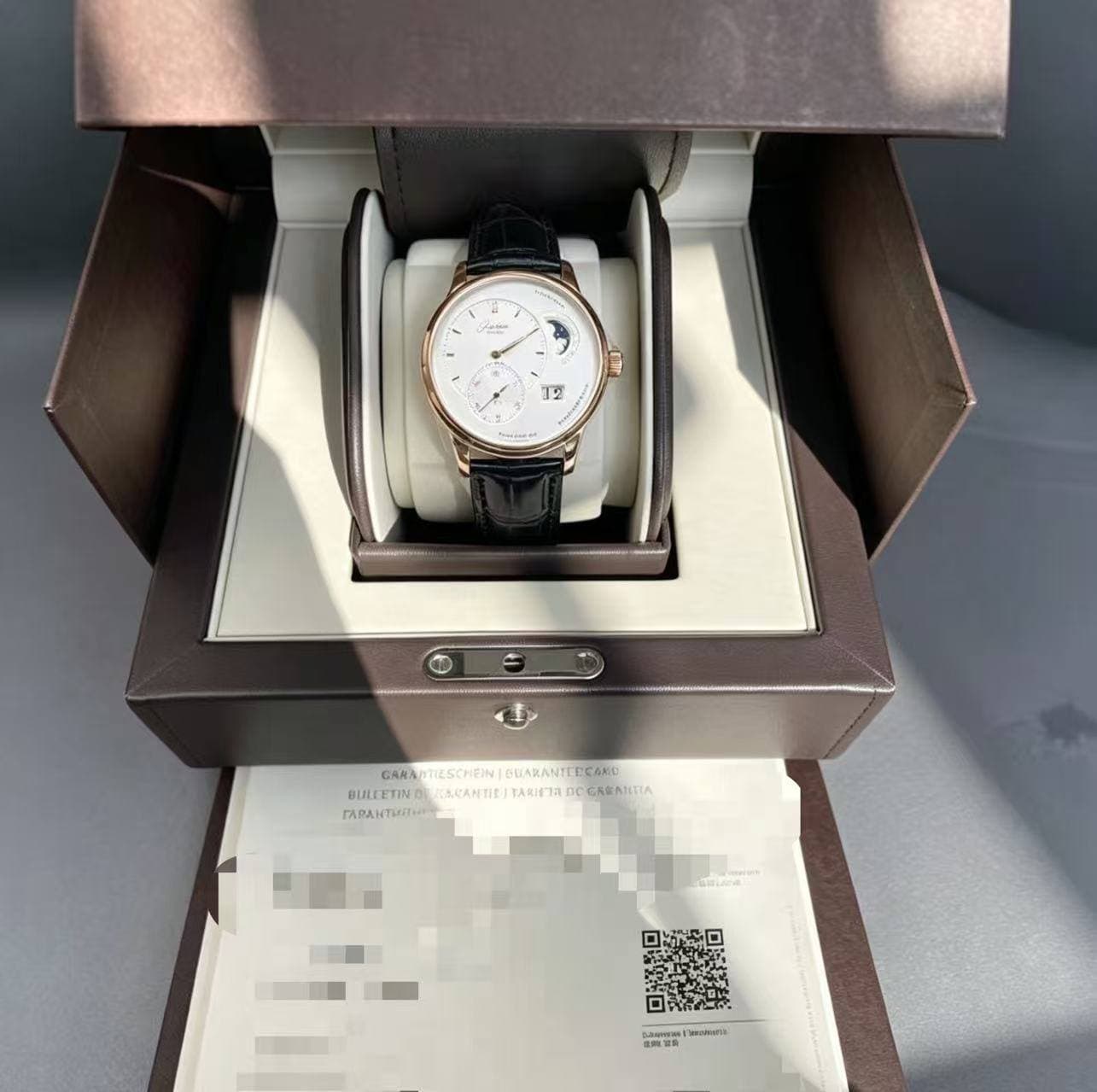 May be an image of wrist watch and text