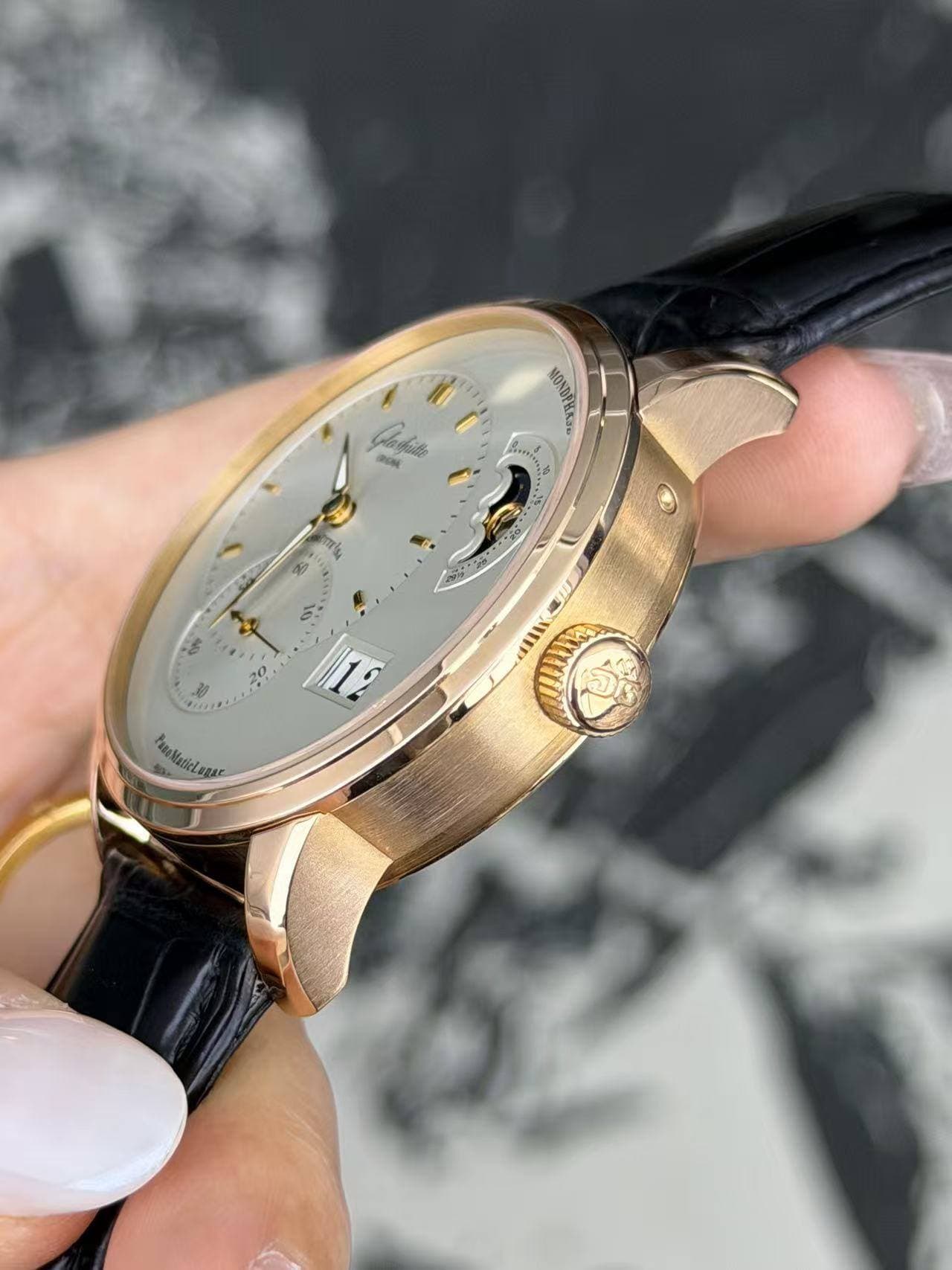 May be an image of wrist watch and text