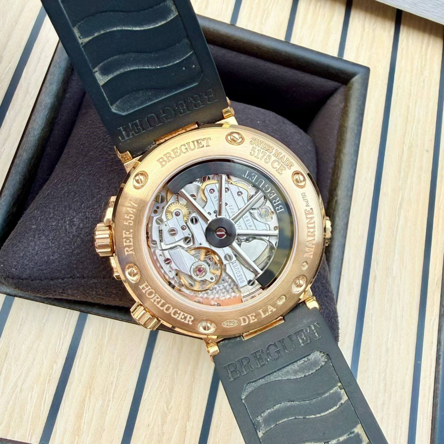 May be an image of wrist watch and text