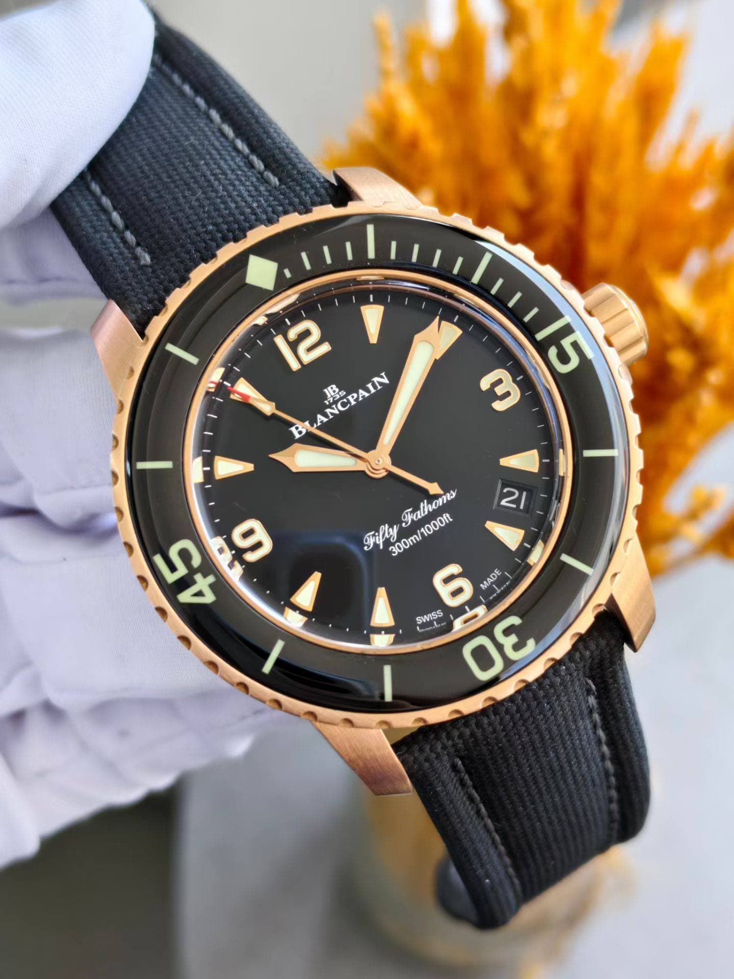 May be an image of wrist watch and text
