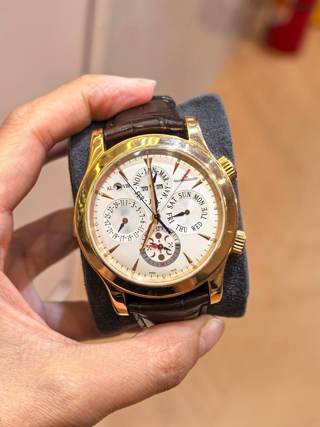 May be an image of wrist watch and text
