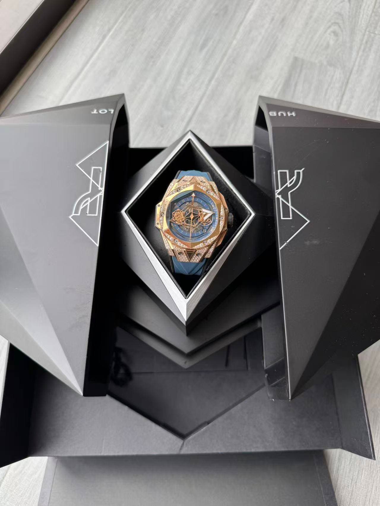 May be an image of wrist watch and text