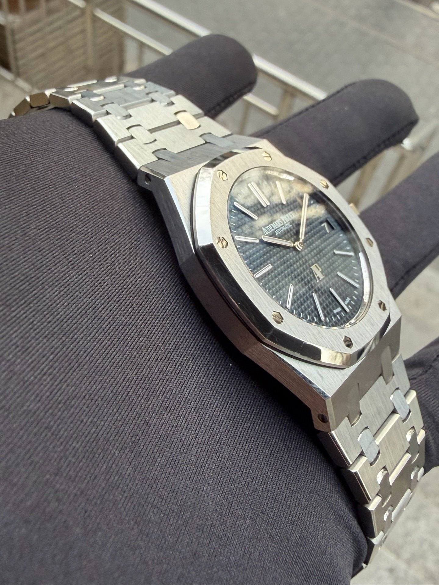 May be an image of wrist watch and text