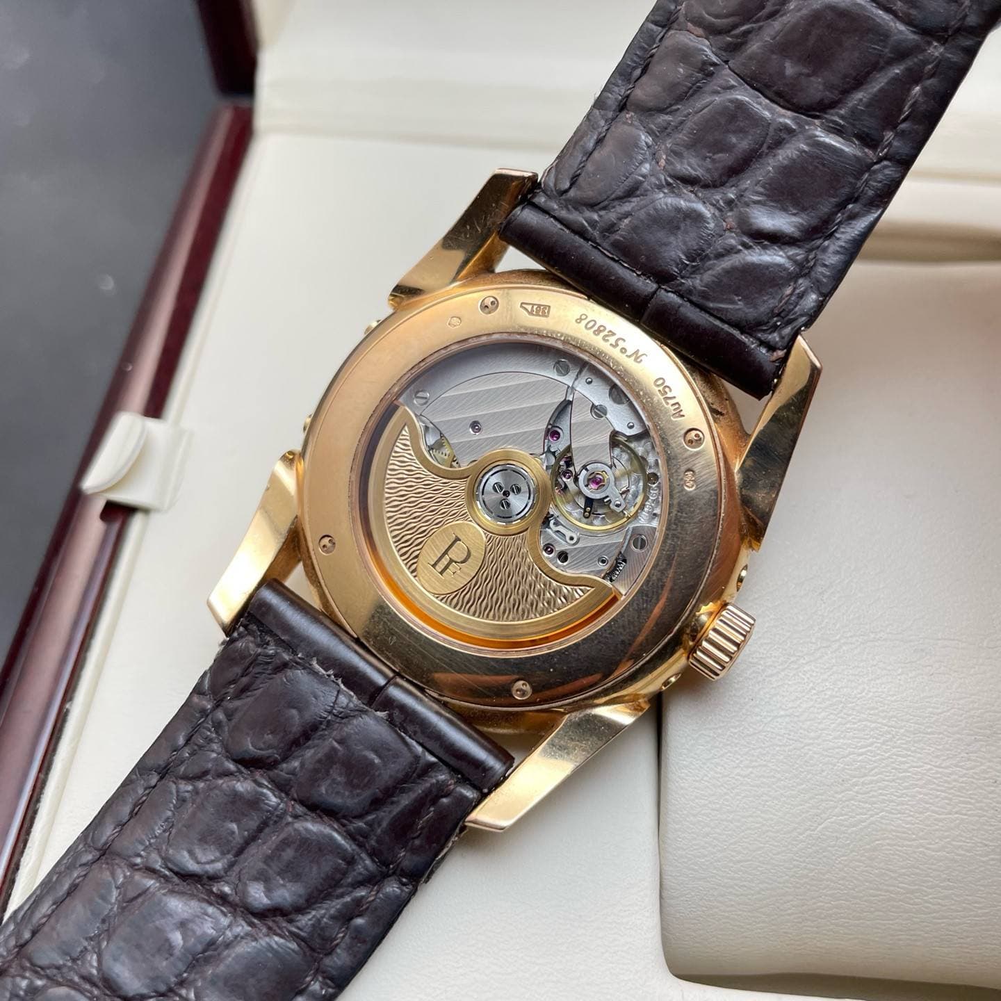 May be an image of wrist watch and text