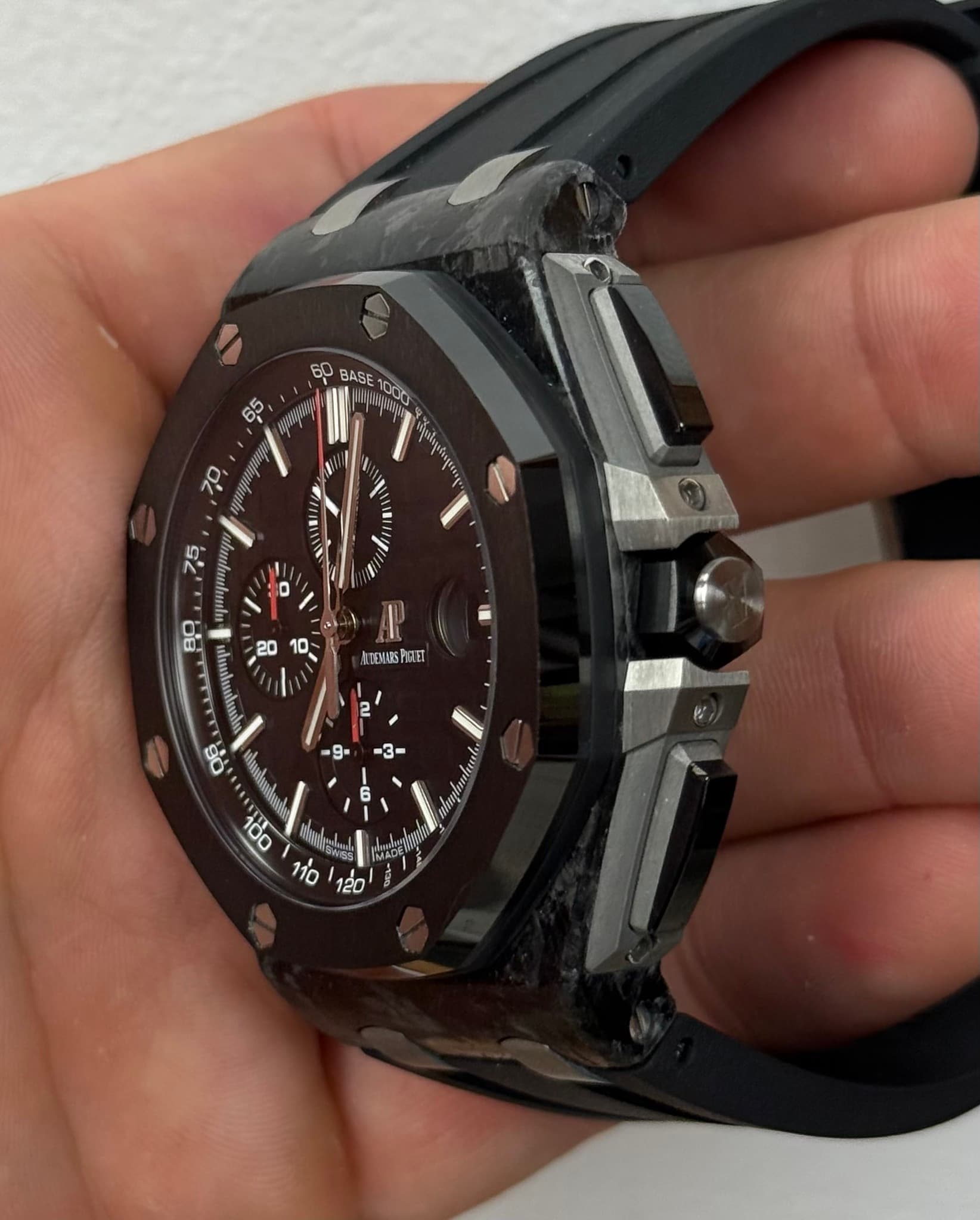 May be an image of wrist watch and text