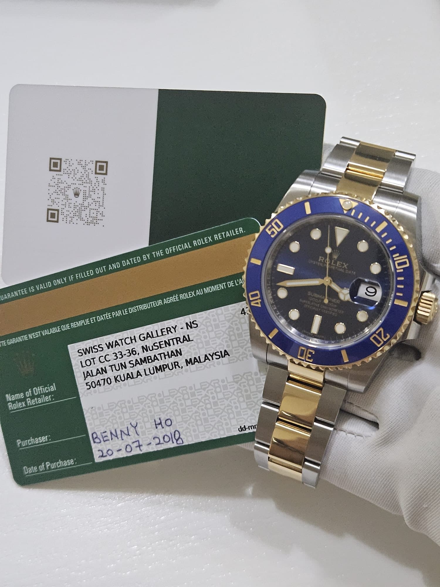 May be an image of wrist watch and text that says '1121 口 THE OFFICIAL ROLEX RETAILER. ONLY IF FILLED OUT AND DATED ARANTEE VALID 50 024 REMPLIEET GARANTIENEST VALABLE 10 ul 9 AO…