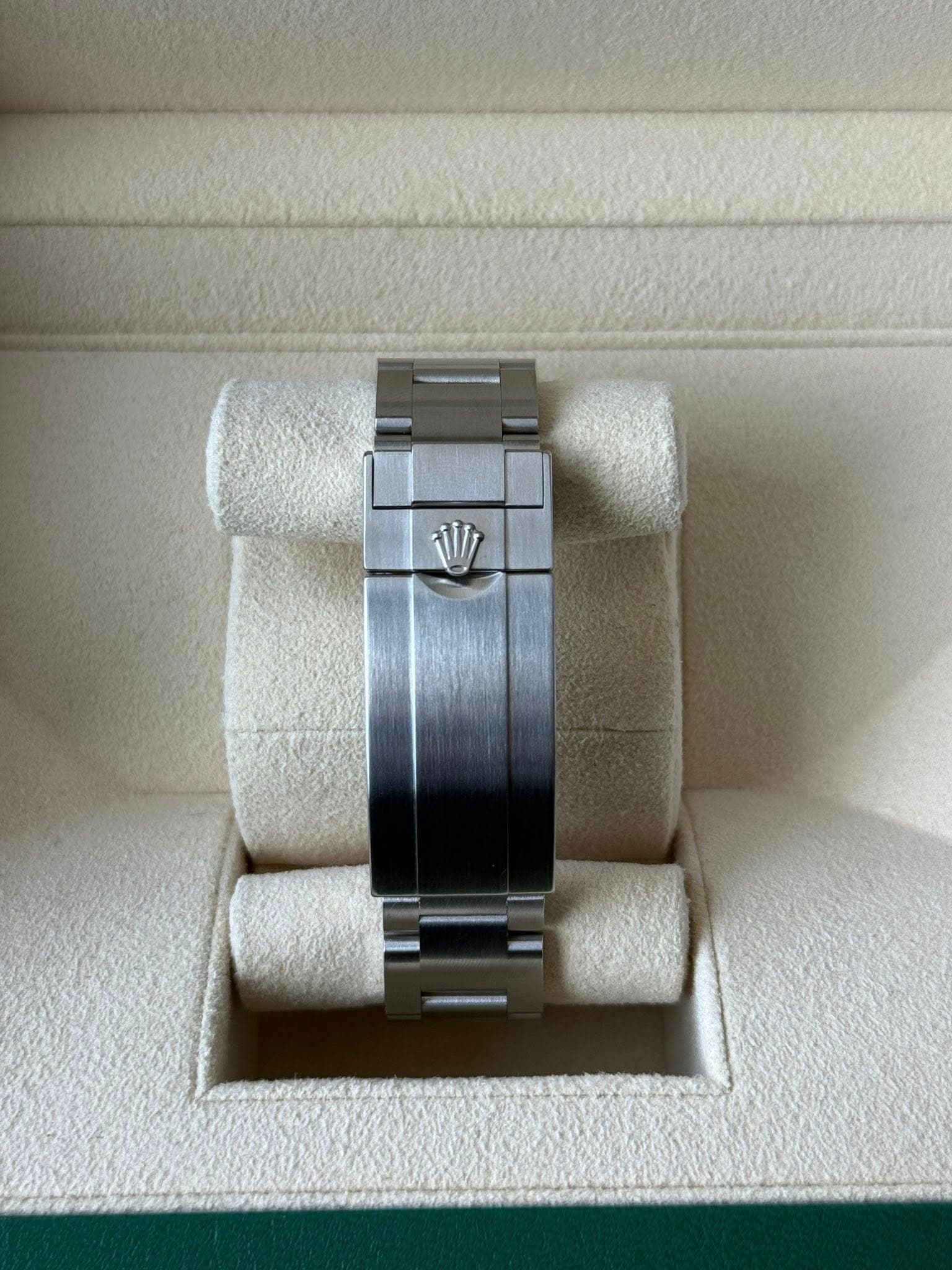 May be an image of wrist watch and text