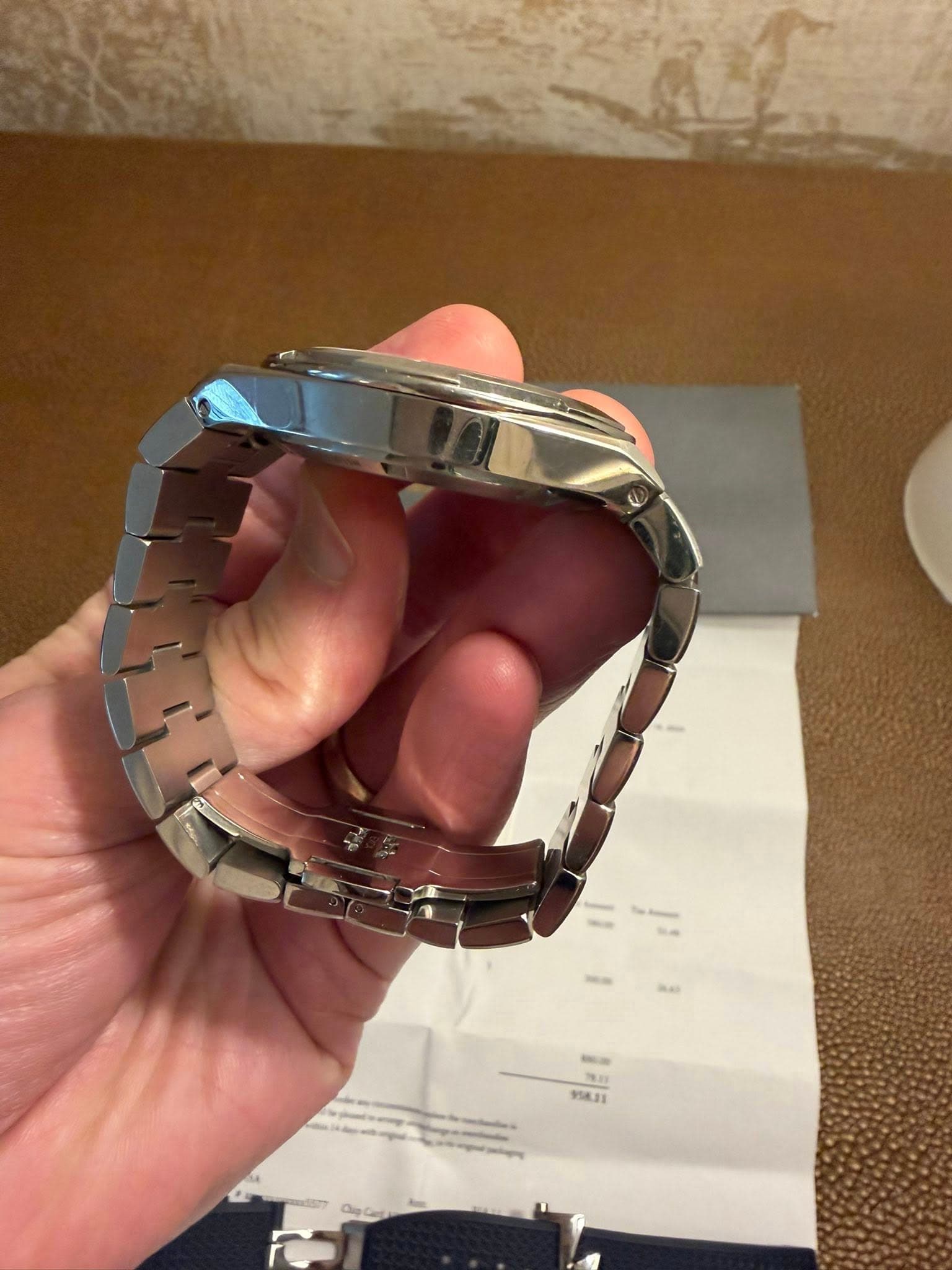 May be an image of digital watch and text