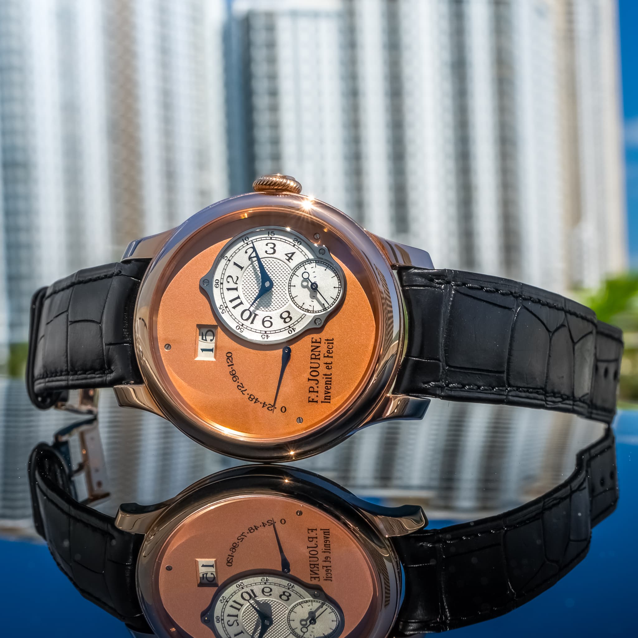May be an image of wrist watch and text