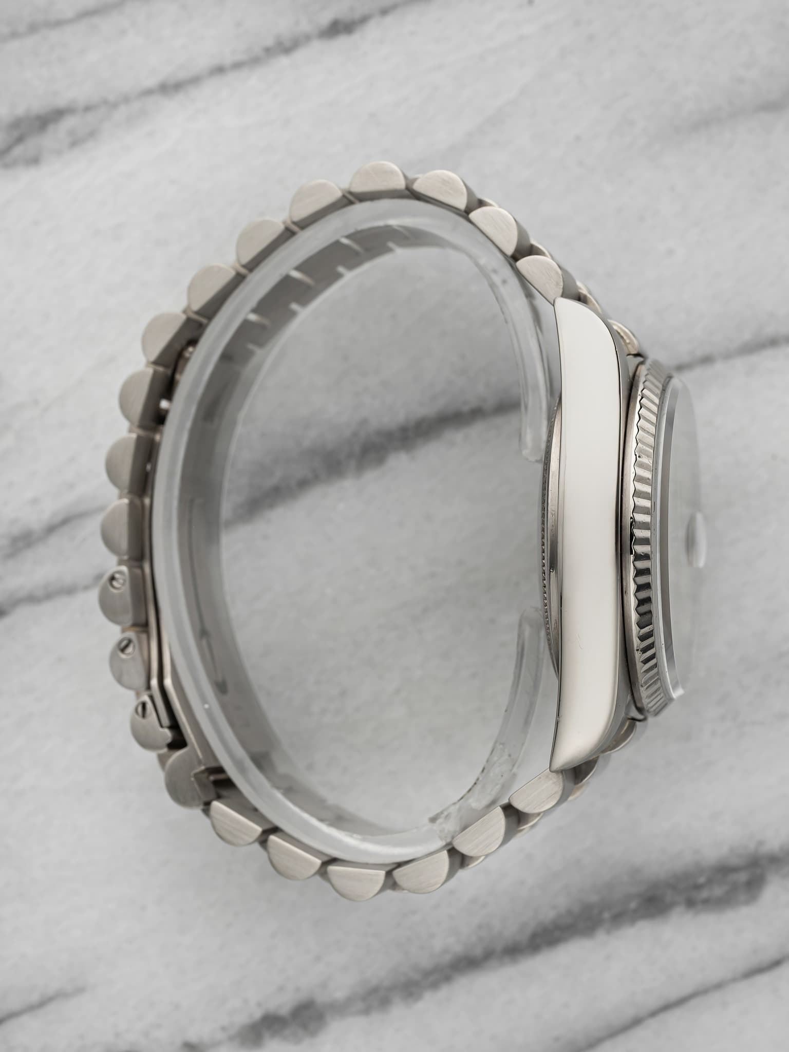 May be an image of jewelry and wrist watch