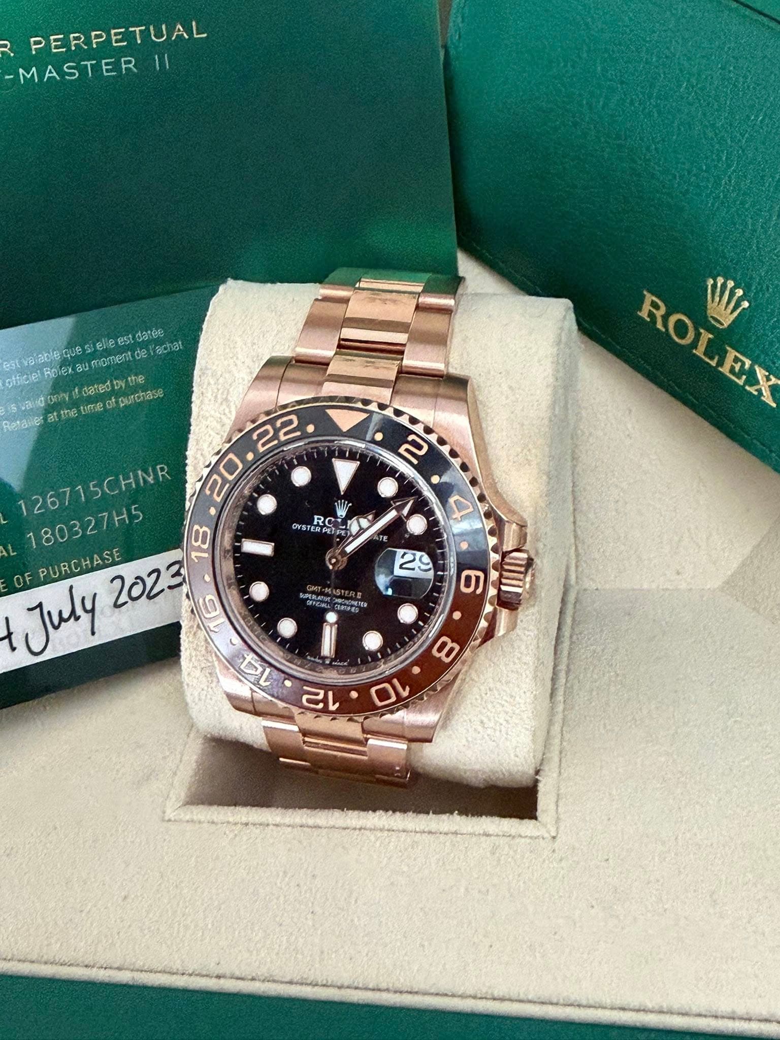 May be an image of wrist watch and text
