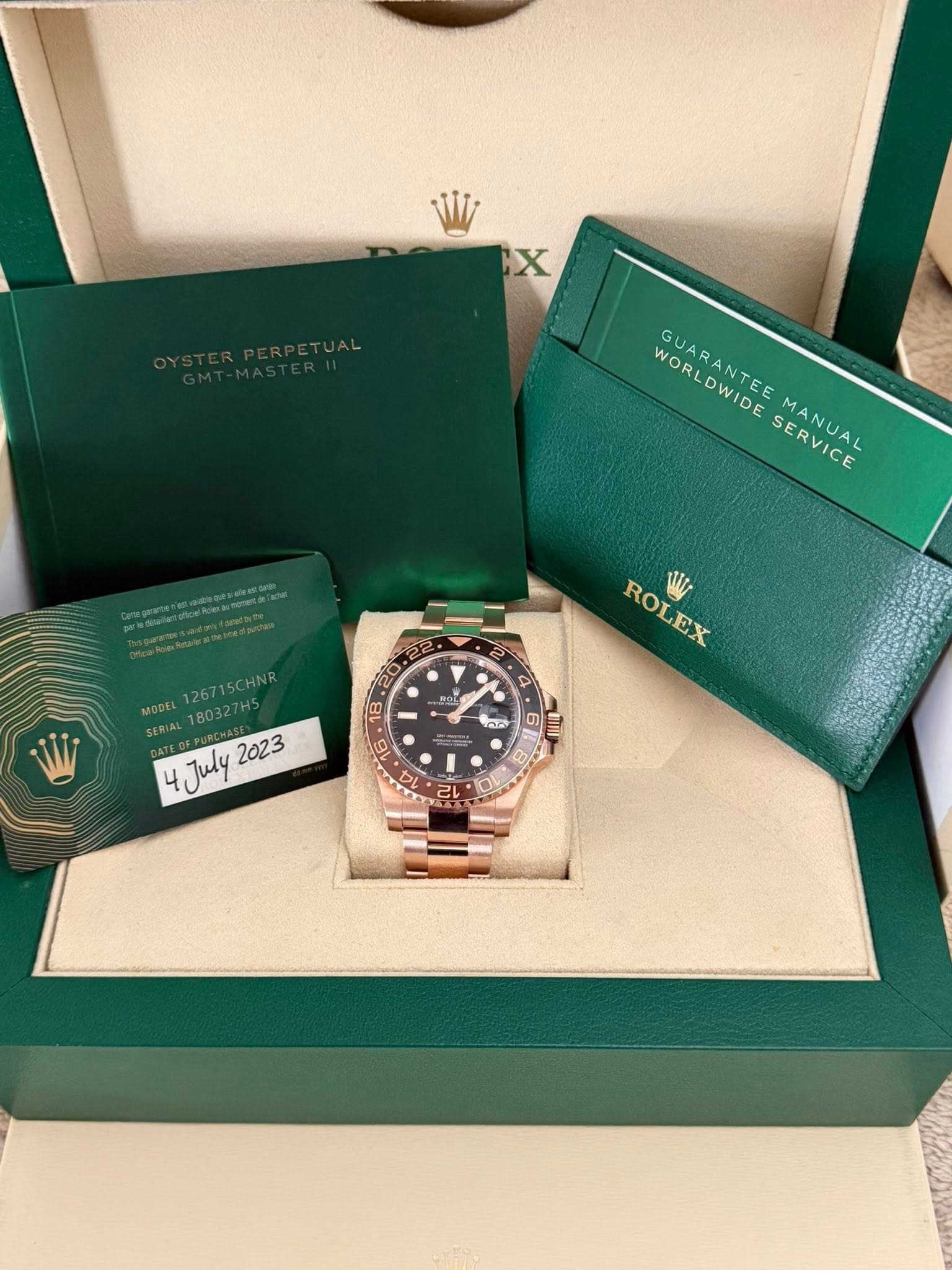 May be an image of wrist watch and text that says 'W X WORLDWTE WORLDWIDE WORLDWIDE GUARANTEE SERVICE MANUAL MENENoEples MOOEL126715CHNR 126715CHNR MODEL 180327H5 SERIA…