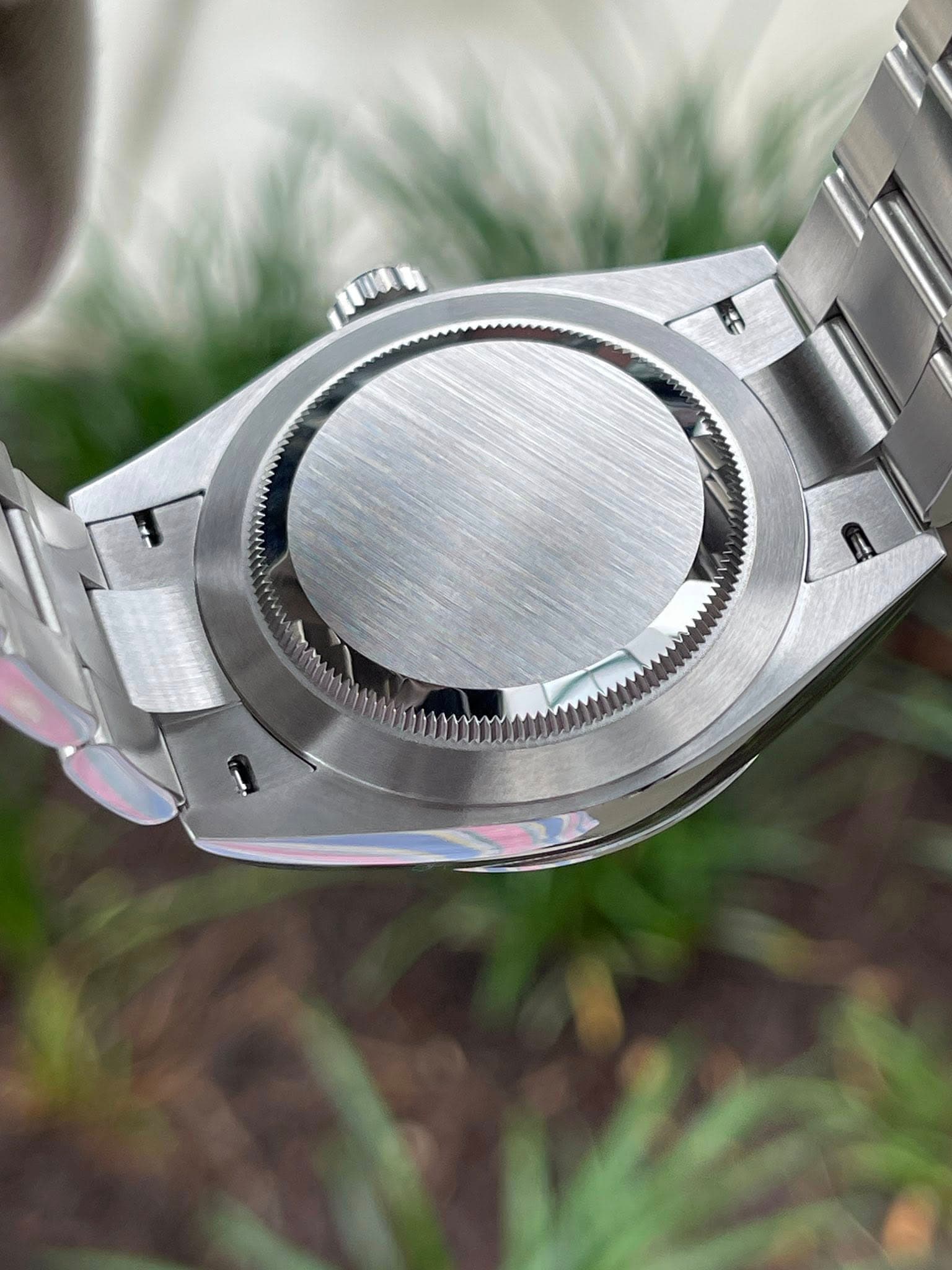 May be an image of wrist watch and text