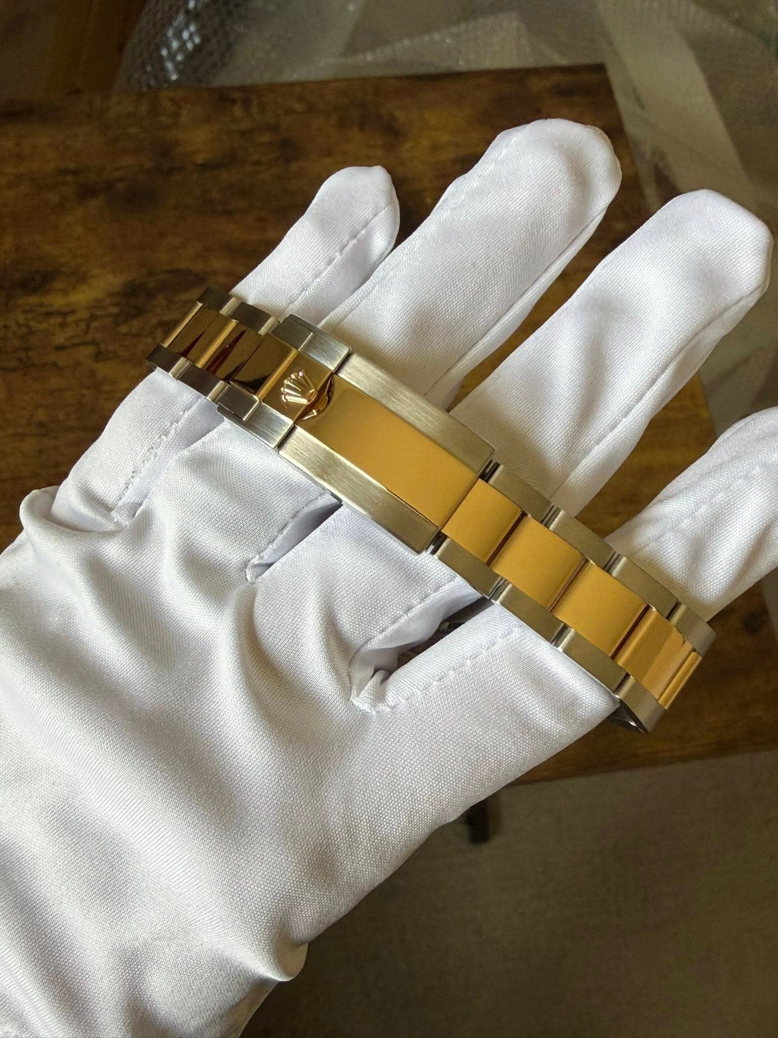 May be an image of brass and wrist watch