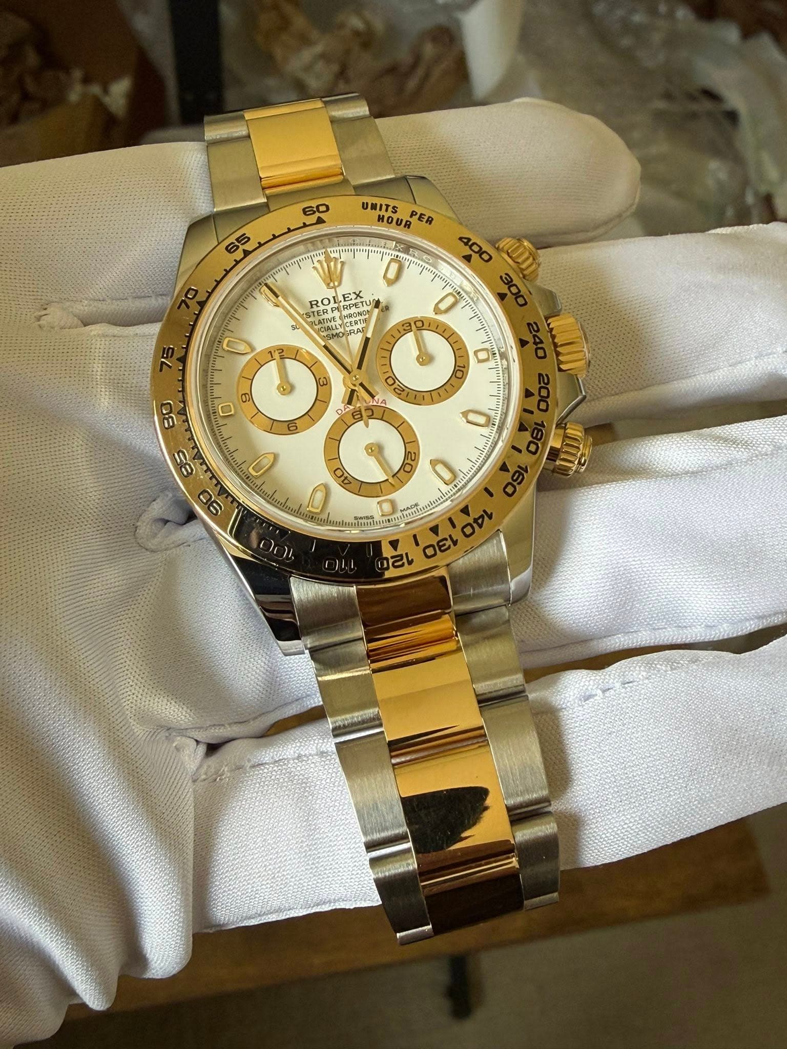 May be an image of wrist watch and text