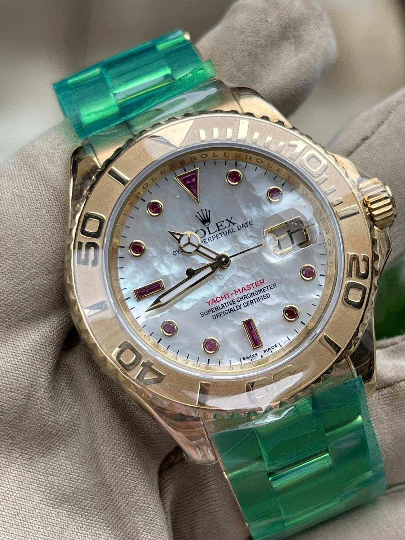 May be an image of wrist watch and text that says '٥ O 50 O O PERPETUALDATE LEX DATE PERPETUALD MASTER CHRONOMETER METER SUPERLATIVEC YACHT- YACHT-MASTER CERTIFIED OFFICIALLY 20…
