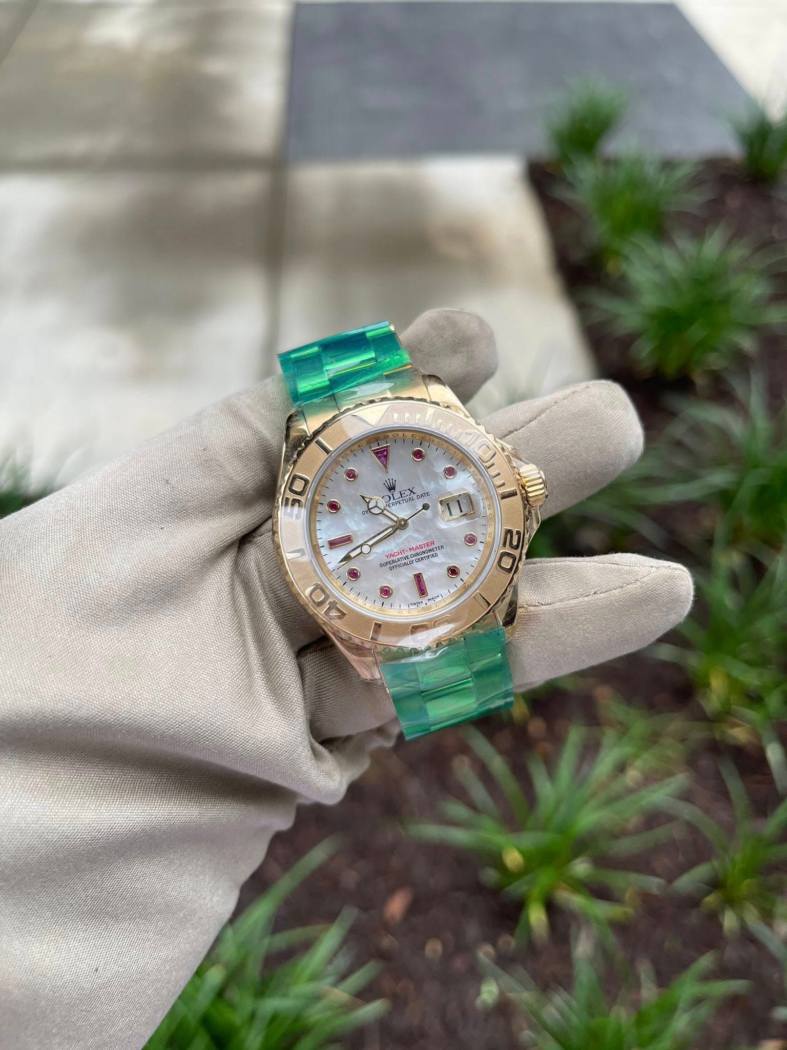 May be an image of wrist watch and text