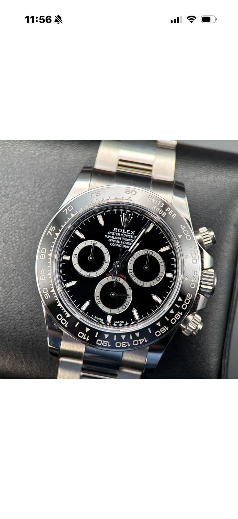 May be an image of wrist watch and text