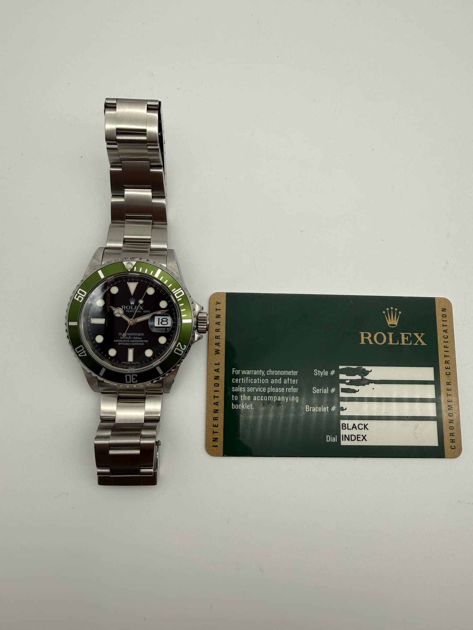 May be an image of wrist watch and text that says '50 10 18 A ROLEX Style Farwaranty.chransmeter For warranty, chronometer certitication after salesserviceplesscruler tu…