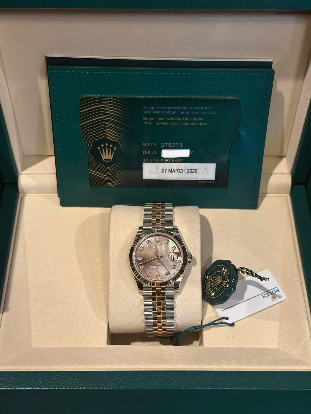 May be an image of wrist watch and text that says 'ROI O 07 MARCH 07MARCH2026 2026 แ 9 TE X3 IOR 401'