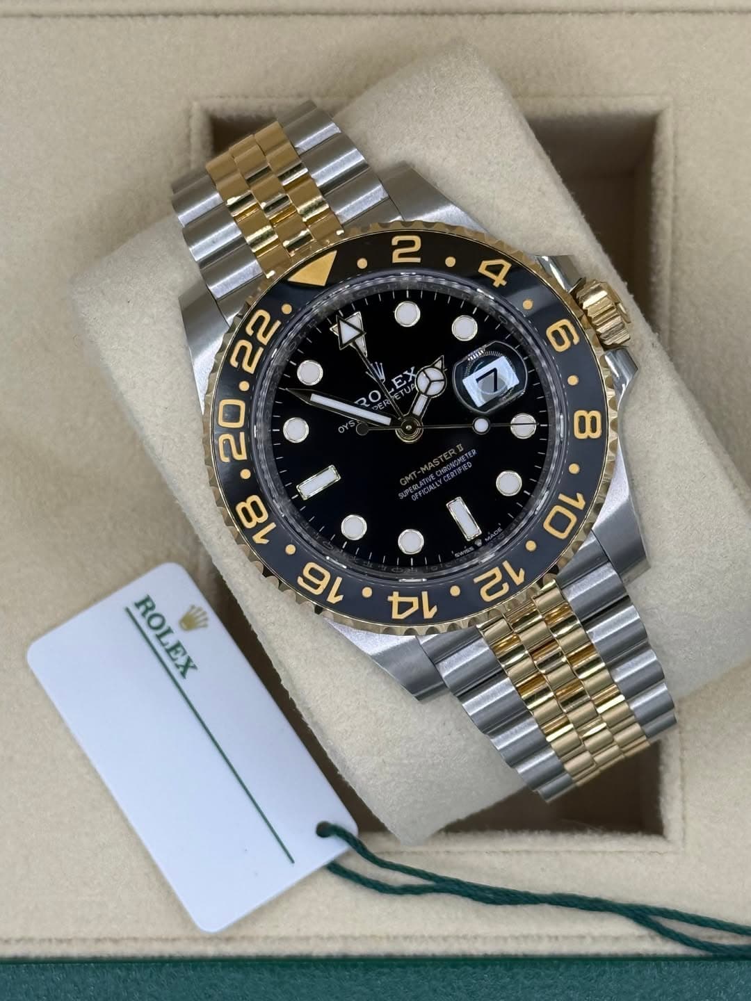 May be an image of wrist watch and text