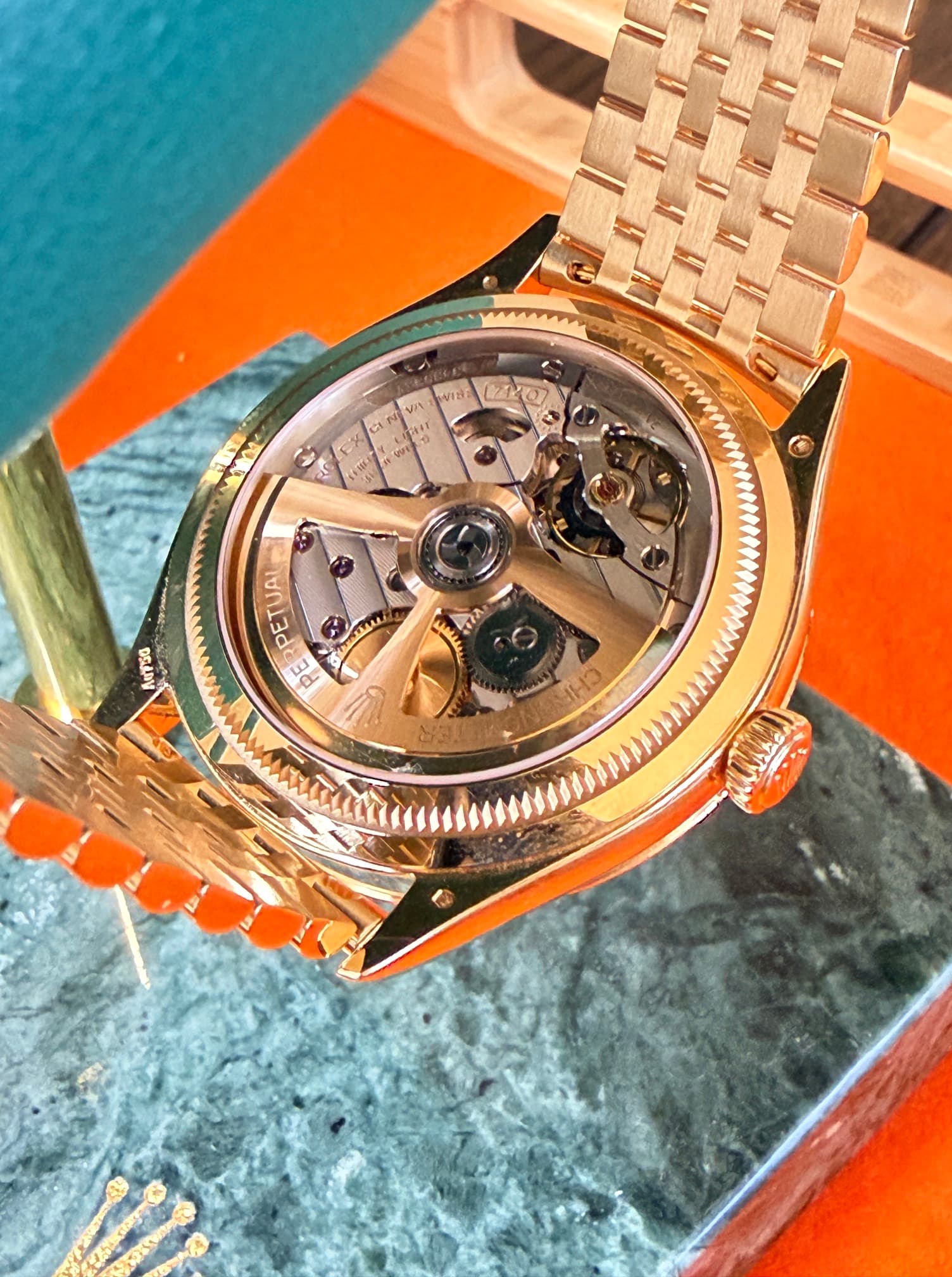 May be an image of wrist watch and text