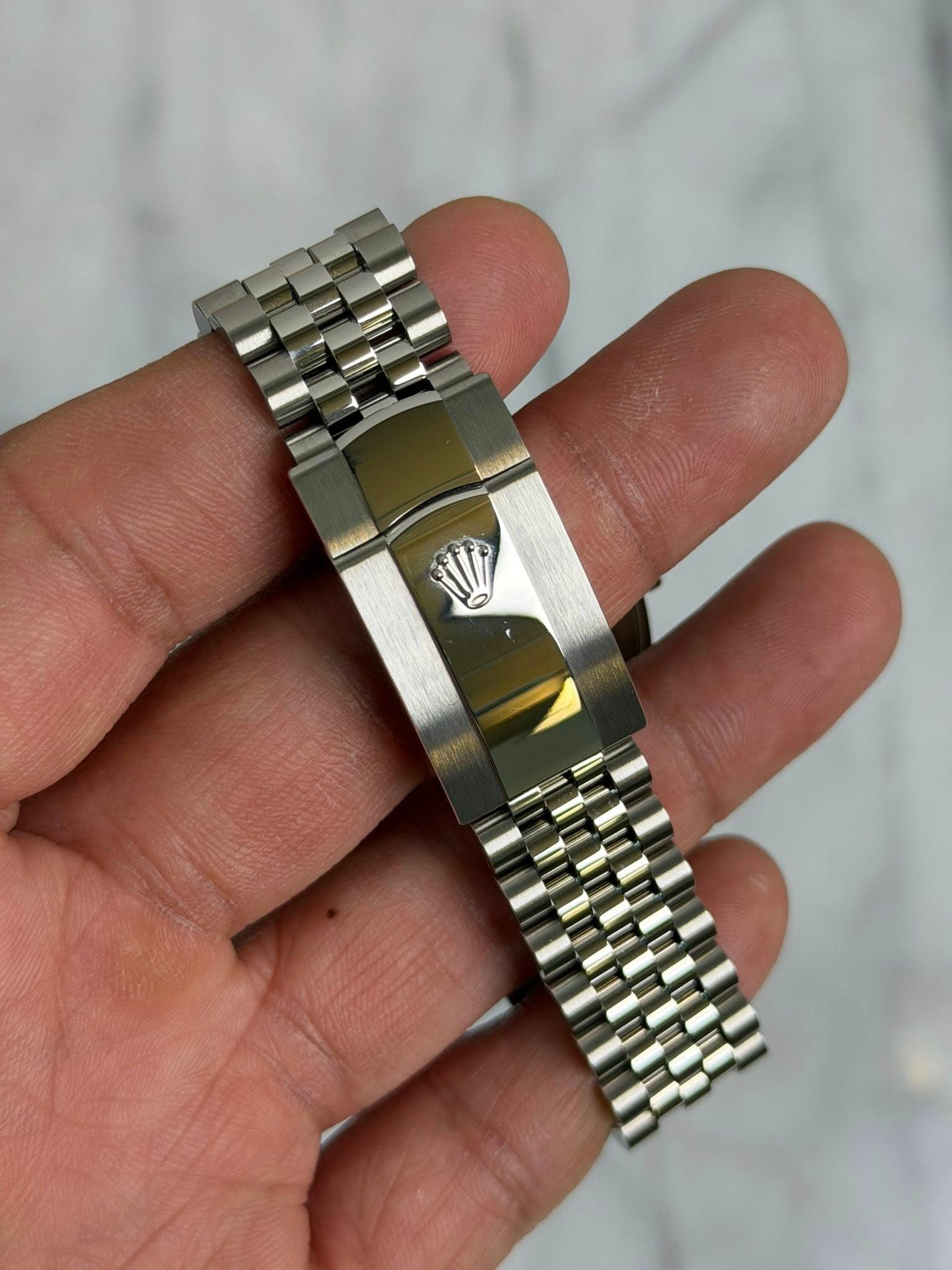 May be an image of wrist watch