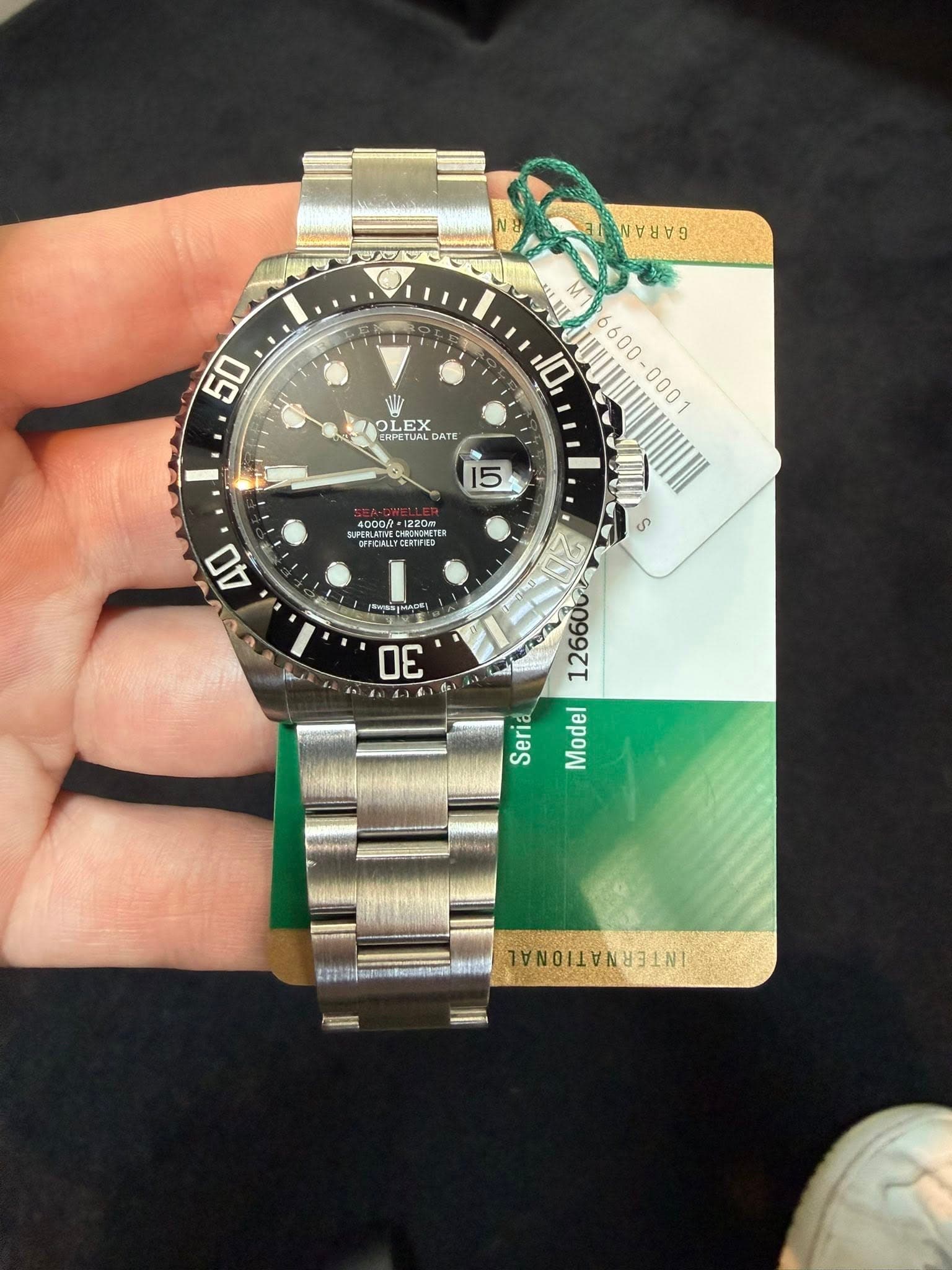 May be an image of wrist watch and text